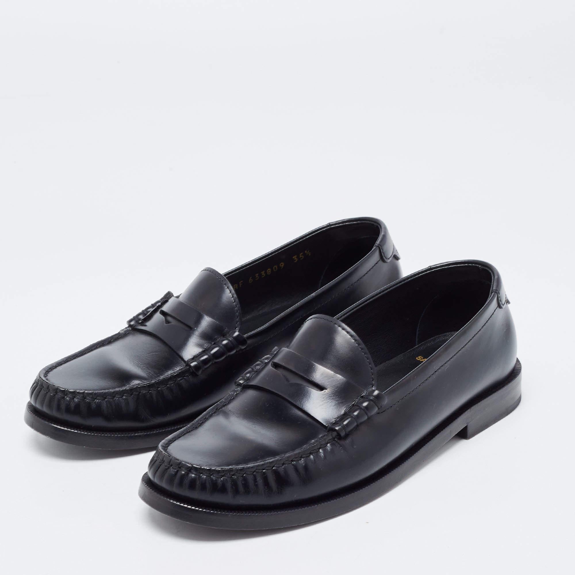 Stylish and super comfortable, this pair of loafers by Saint Laurent will make a great addition to your shoe collection. They have been crafted from leather and styled in a classy black shade. Leather insoles and rubber outsoles beautifully complete