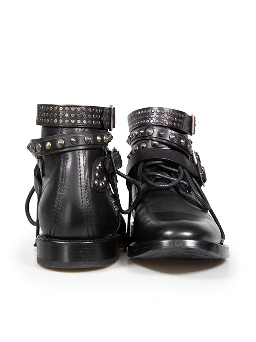 Saint Laurent Botines de piel negra con tachuelas y cinturón Talla IT 38 Negro en venta
