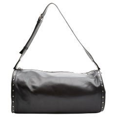 Saint Laurent Borsone da palestra in pelle nera con borchie