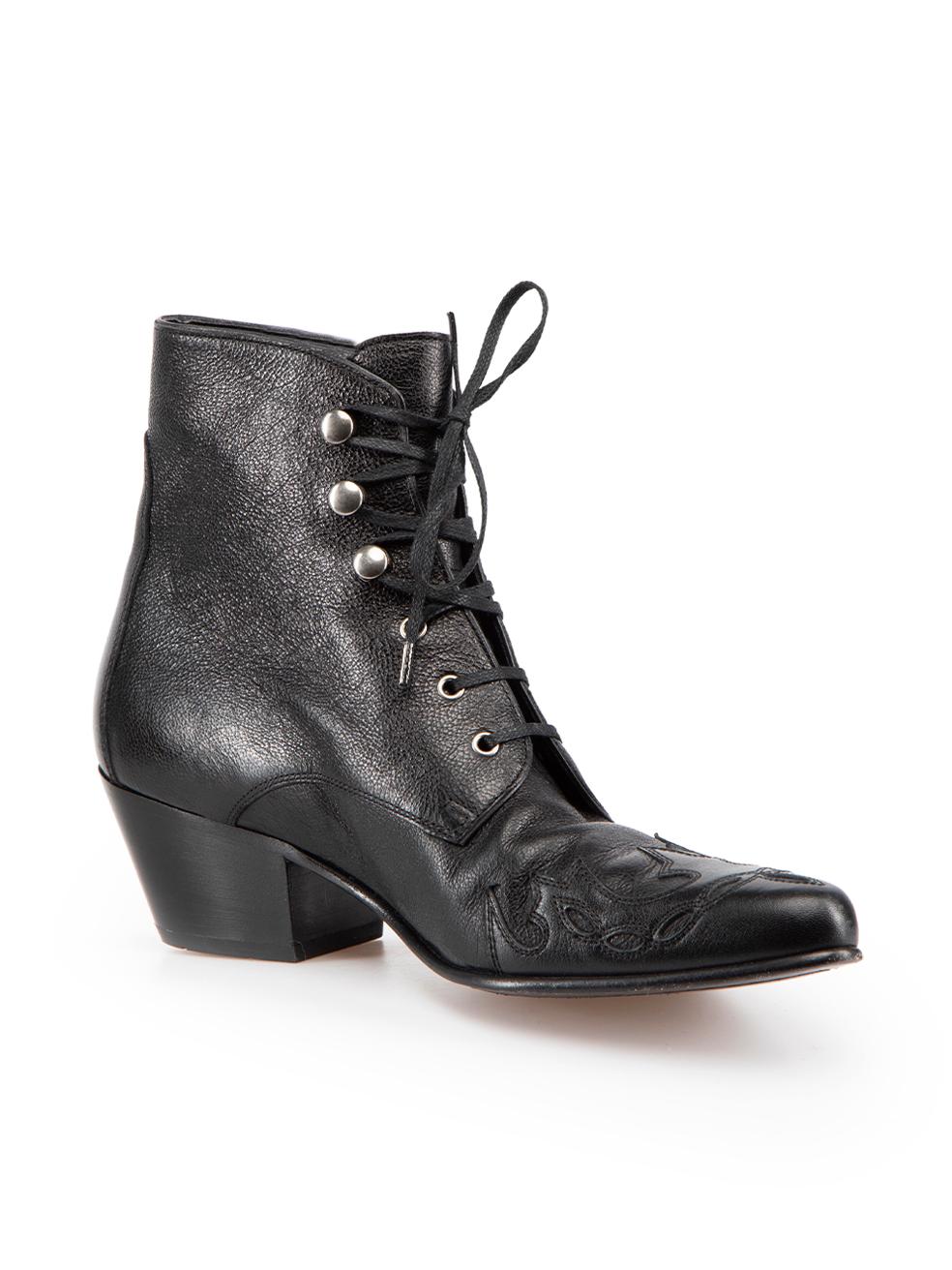 CONDITION is Very good. Minimal wear to boots is evident. Minimal wear to both boot heels and toes with indents to the leather on this used Saint Laurent designer resale item.
 
 Details
 Susan
 Black
 Leather
 Ankle boots
 Point toe
 Mid heel
