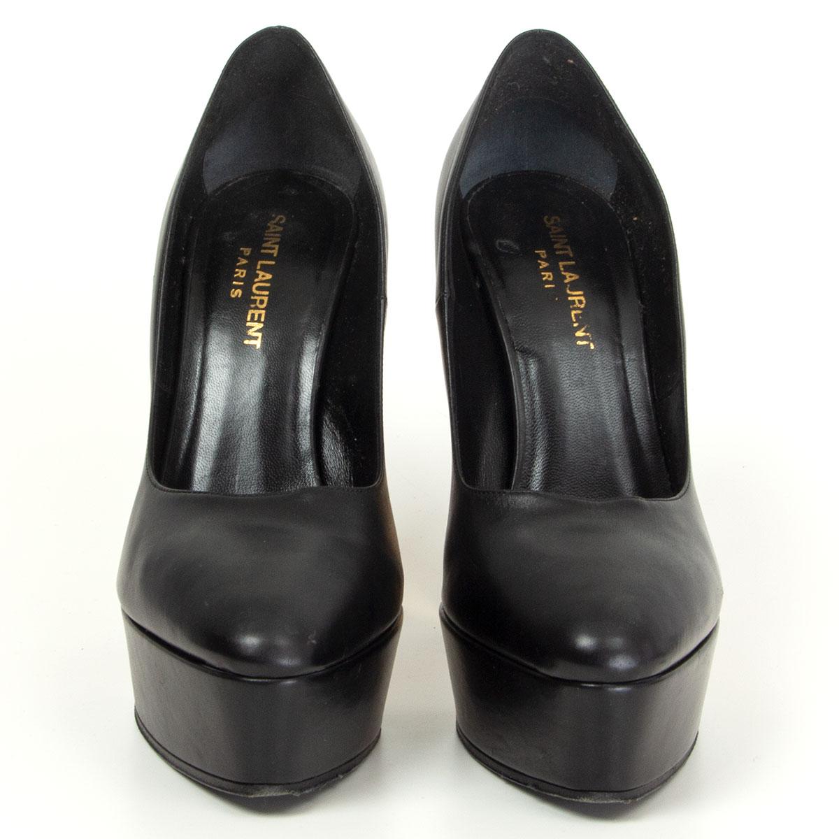 100% authentic Saint Laurent platform pumps in black calfskin featuring gold-tone metal heel detail. Have been worn and are in excellent condition. Come with dust bag. 

Measurements
Imprinted Size	38
Shoe Size	38
Inside Sole	25.5cm