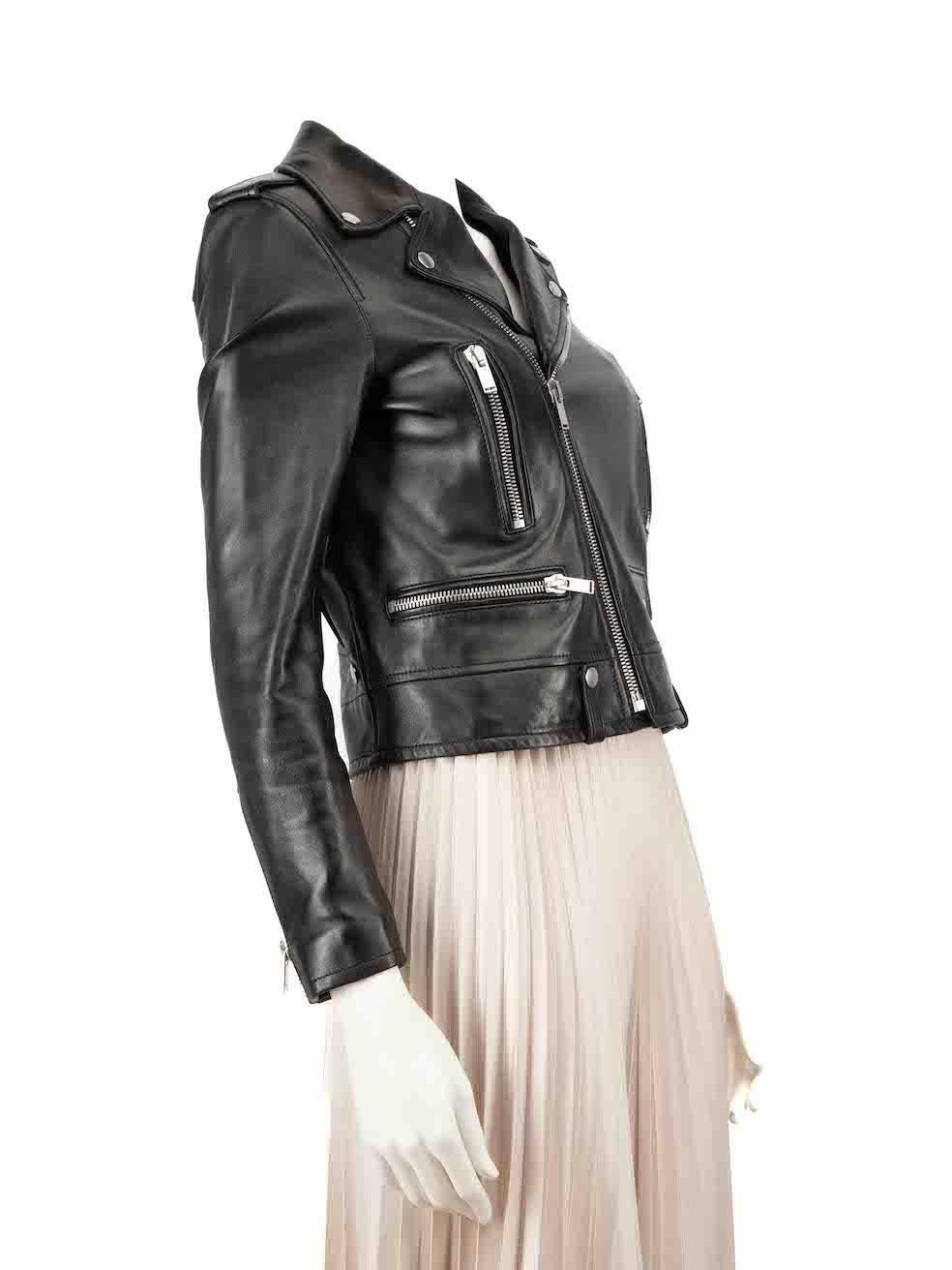 CONDITION is Very good. Minimal wear to the jacket is evident. Minimal abrasion on both cuffs on this used Saint Laurent designer resale item.
 
 
 
 Details
 
 
 Black
 
 Leather
 
 Biker jacket
 
 Snap button collar
 
 Zipped cuffs
 
 Zip