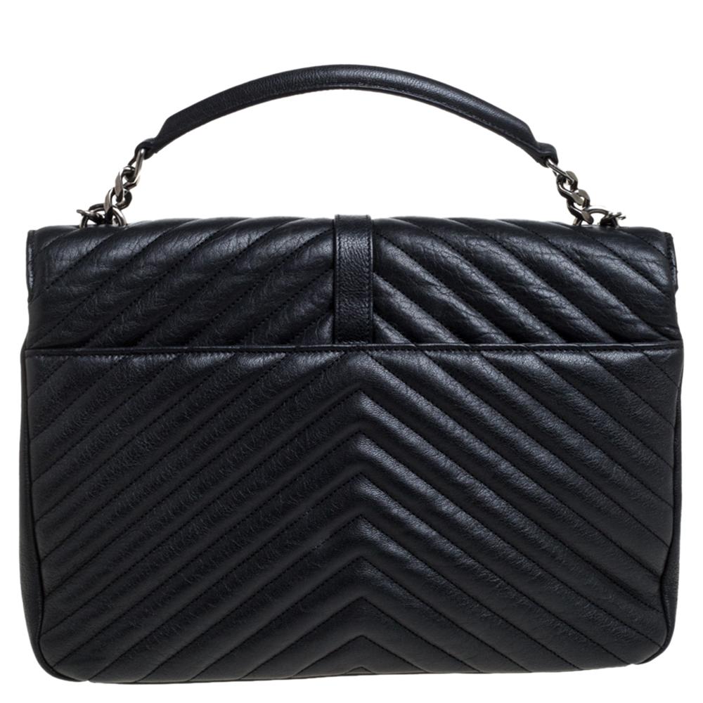 Elevate your everyday looks with this reliable Matelasse-quilted bag by Saint Laurent. It is crafted from quality leather in a black shade. It features the YSL logo in silver-tone on the front flap, a spacious interior, a top handle, and shoulder