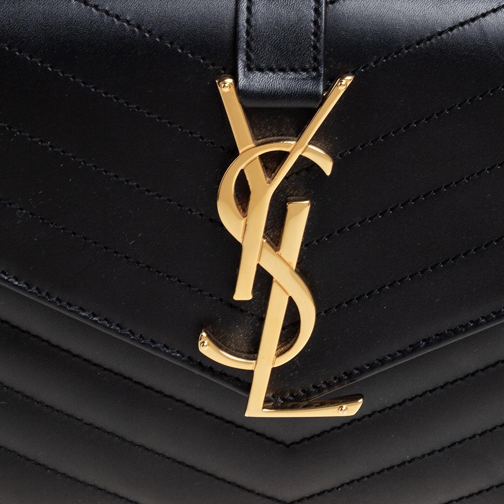 Saint Laurent - Pochette a busta in pelle matelassé nera con monogramma 6