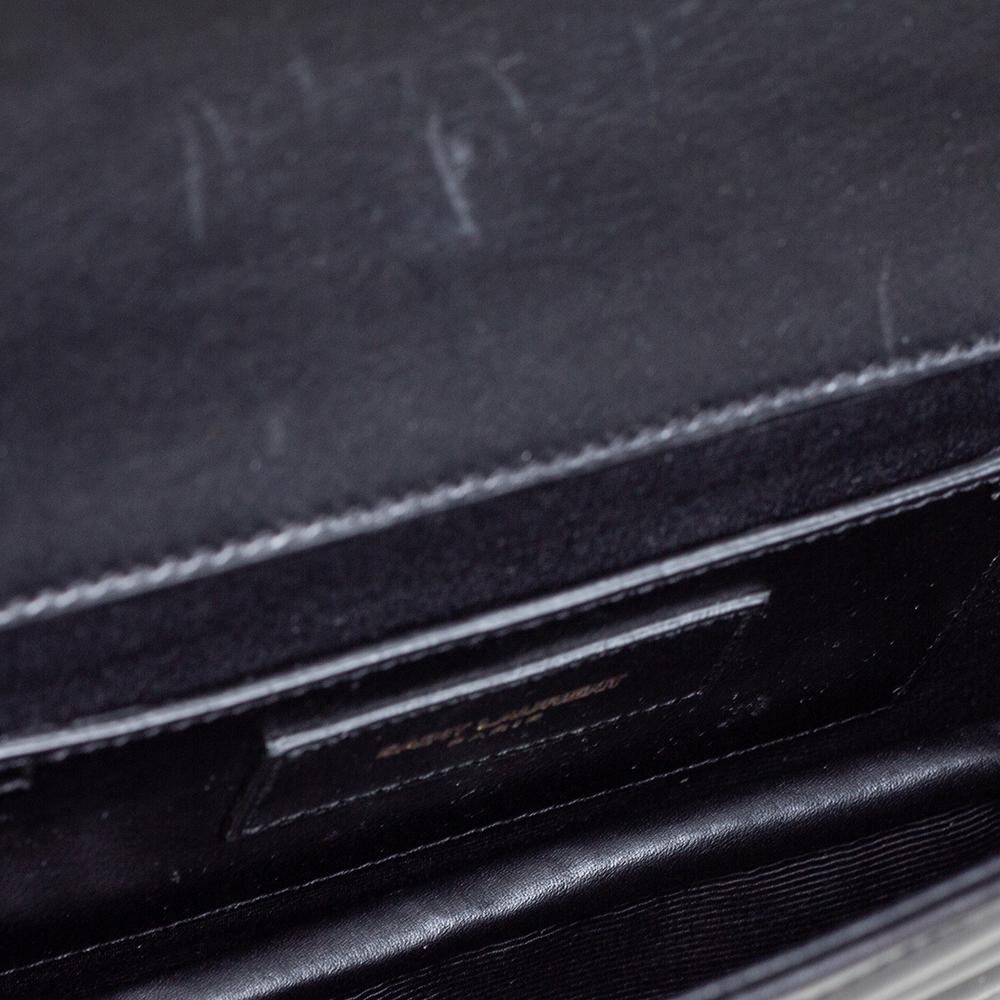 Saint Laurent - Pochette a busta in pelle matelassé nera con monogramma 1