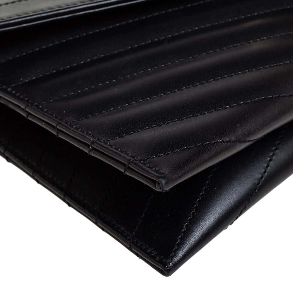 Saint Laurent - Pochette a busta in pelle matelassé nera con monogramma 3