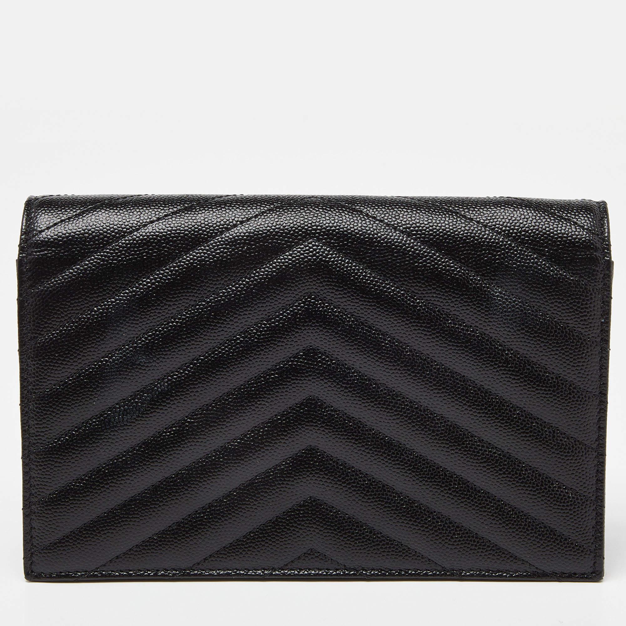 Fashioned using Matelassé leather into a structured silhouette, this Saint Laurent Monogram Envelope WOC has high style and a timeless charm. It has a flap design and the front is highlighted with a gold-tone YSL logo. The interior is lined with