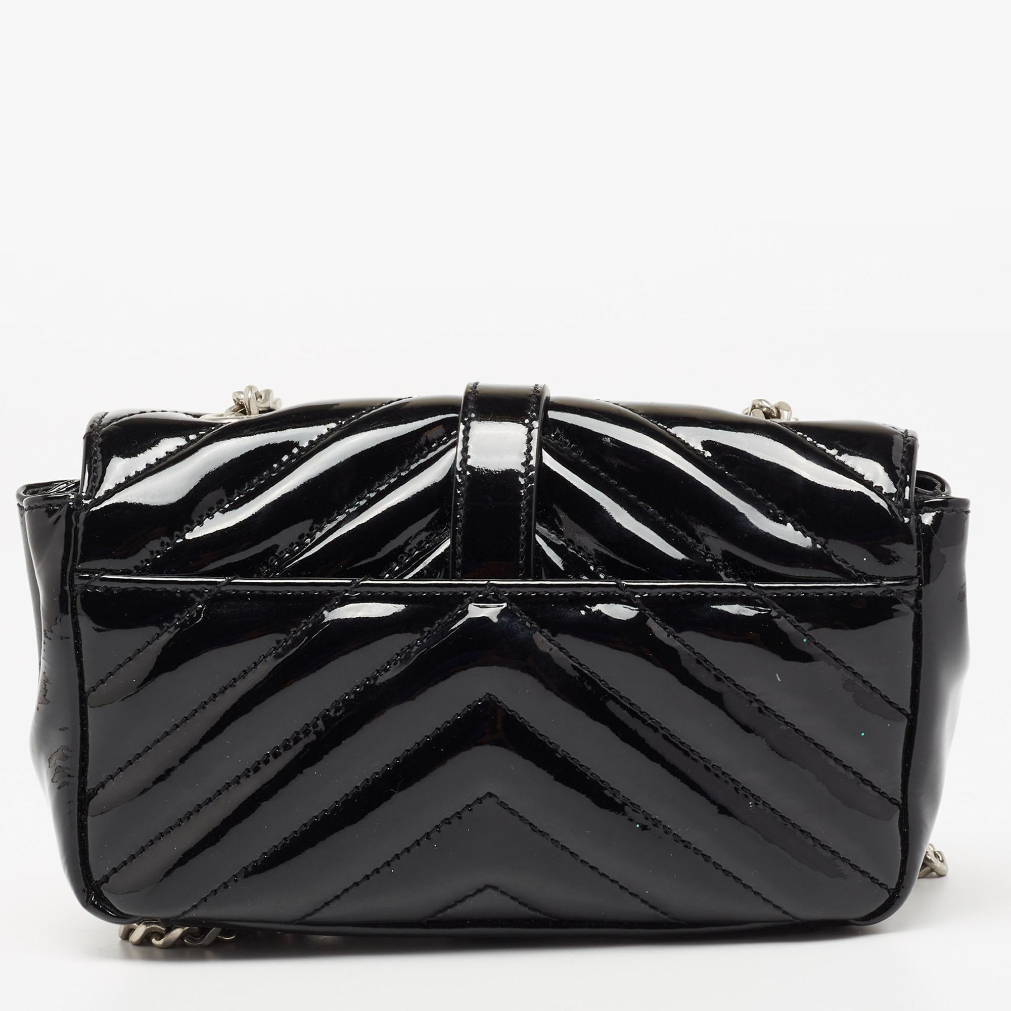 Elegance meets luxury in this chain bag from the House of Saint Laurent. It is created using black matelassé leather, with a silver-toned YSL Monogram attached to the front. It features a roomy interior and a 57 cm chain strap. This gorgeous bag