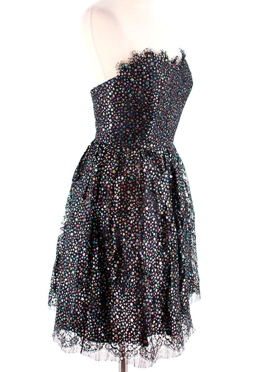 Saint Laurent Black Metallic Stars Lace Trim Strapless Dress

- Structured bodice
- Cocktail dress
- Sleeveless
- Lace tulle
- Fully lined
- Colored star pattern
- Hidden pockets
- Invisible back zipper

Materials:
Main
82% Cotton
18% Polyamide
100%