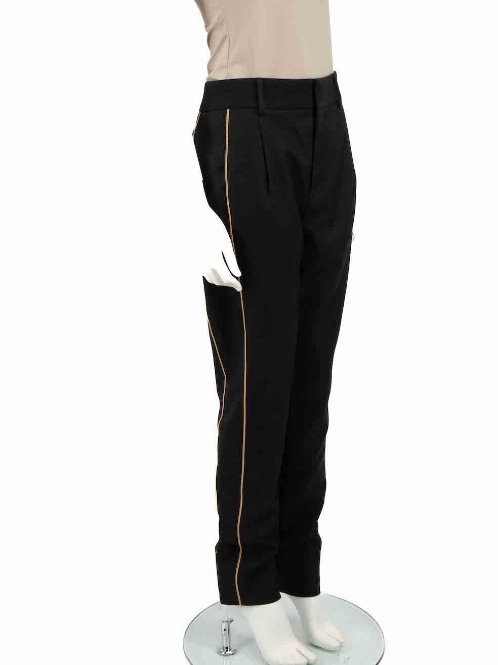 CONDITION is Very good. Hardly any visible wear to trousers is evident. However, the brand label is missing on this used Saint Laurent designer resale item.
 
 
 
 Details
 
 
 Black
 
 Wool
 
 Straight leg trousers
 
 Mid rise
 
 Gold metallic trim