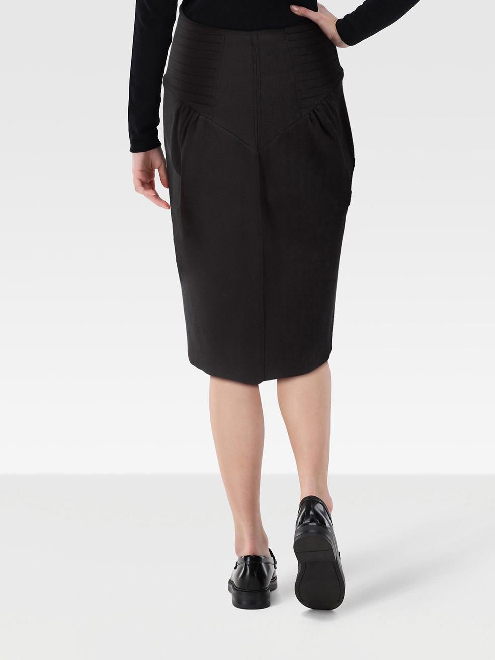 CONDITION is Very good. Minimal wear to the skirt is evident. Loose stitching on the right side of the waist on this used Saint Laurent designer resale item.
 

 

 

 Details
 

 

 Black
 

 Viscose
 

 Skirt
 

 Skirt
 

 Straight fit
 

