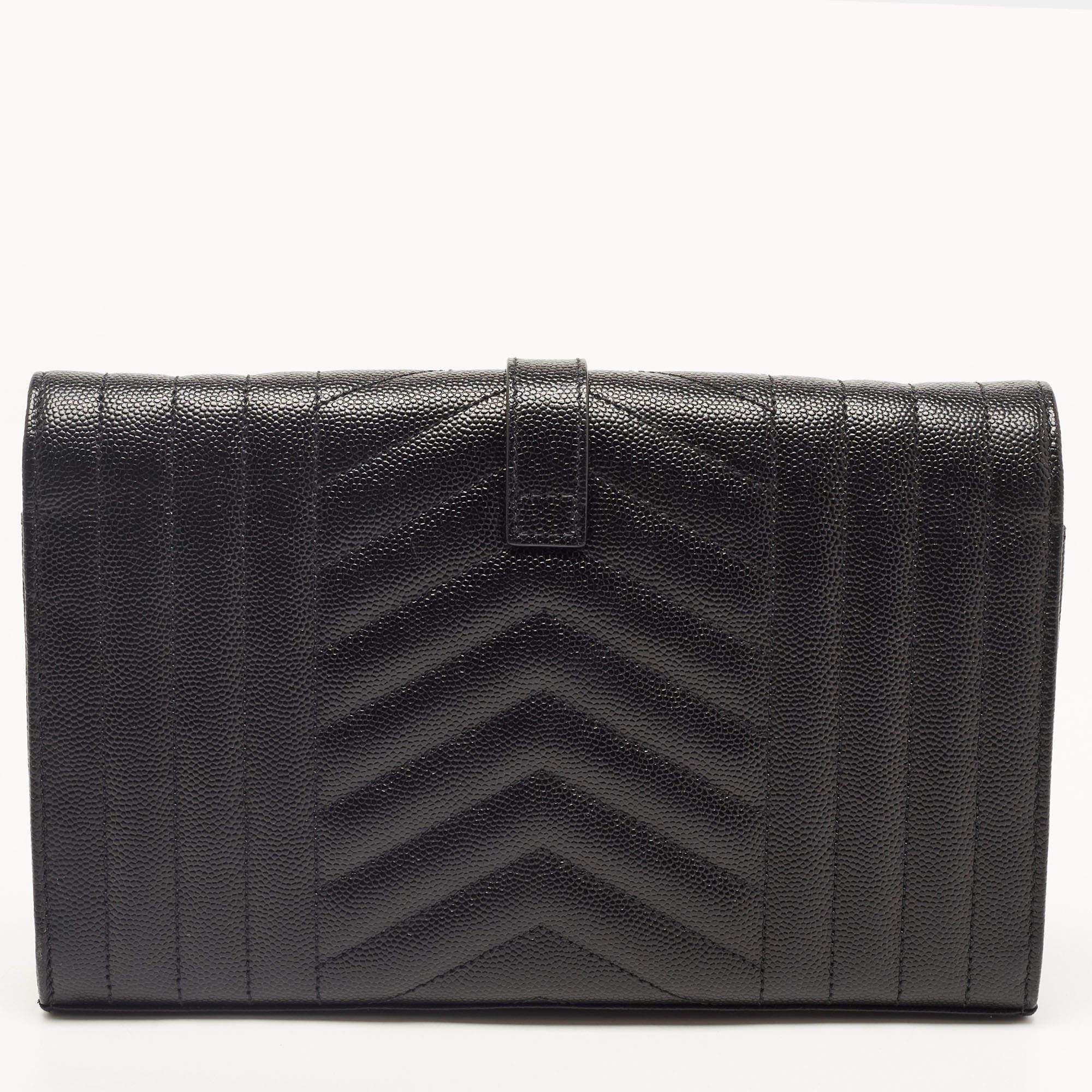 Every design from Saint Laurent has an everlasting impact on the fashion world. The envelope-style flap of this WOC features the iconic 'YSL' logo. It is designed using matelassé leather and has been made practical with a chain link and a luxurious