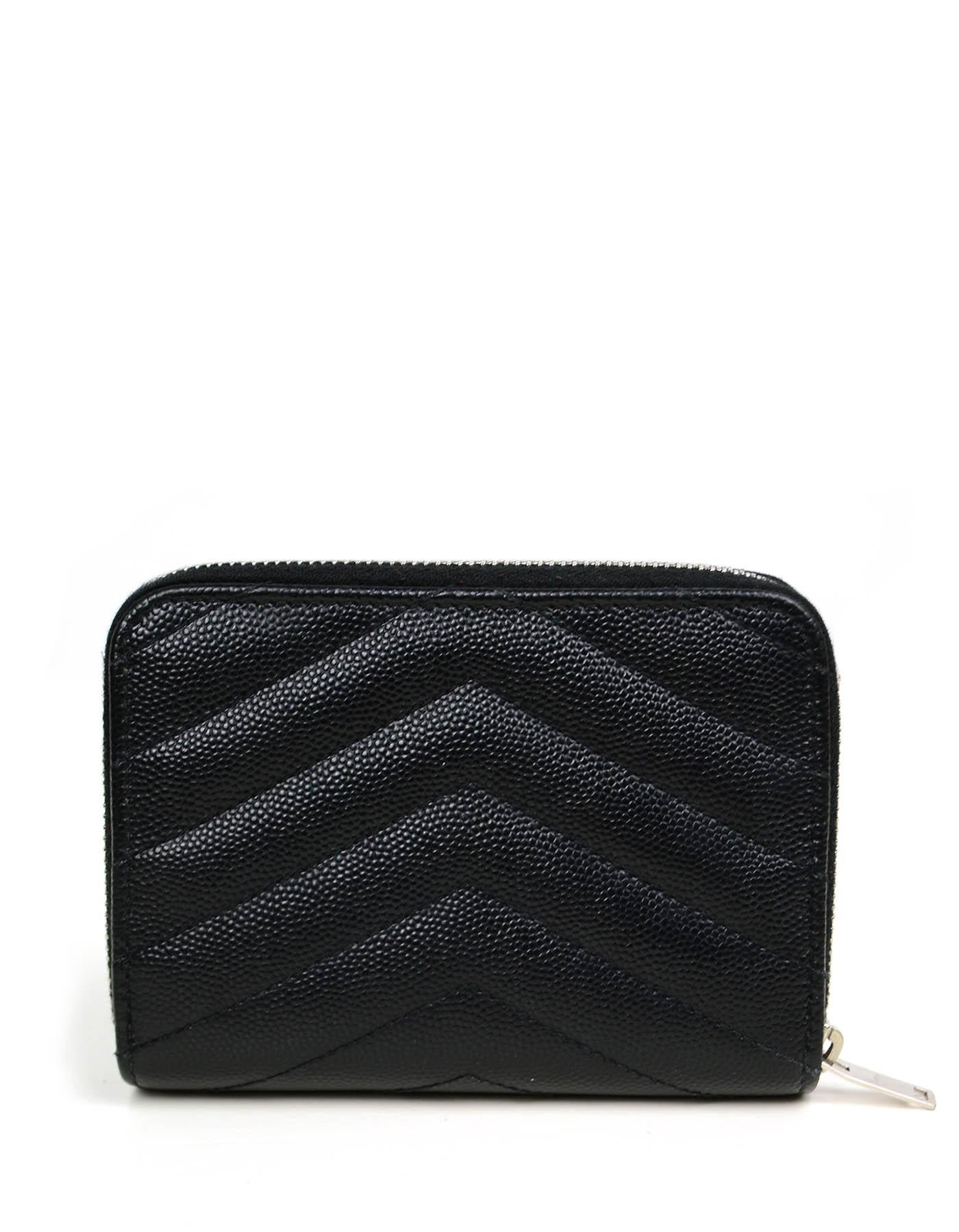 Saint Laurent Monogram Chevron Leather Compact Zip Around Wallet

Made In: Italy
Color: Black
Hardware: Silvertone
Materials: Grained leather
Lining: Grained leather
Closure/Opening: Snap and zip around
Exterior Pockets: Zip around coin