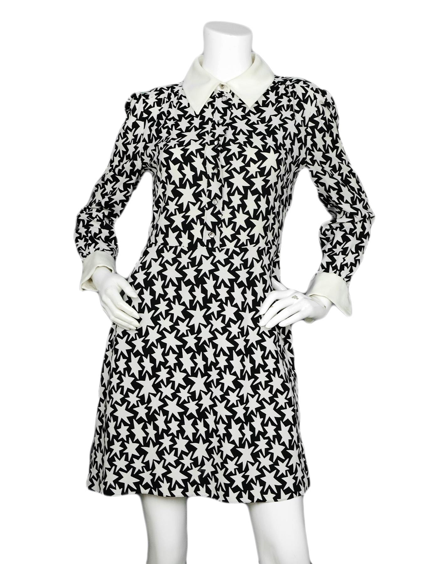 Saint Laurent Black/Off-White Star Print Schoolgirl Collar Dress sz 8

Made In: Italy
Color: Black, Off-white
Materials: 100% Viscose, 100% Silk (Collar)
Lining: 100% Silk
Opening/Closure: Front Buttons
Overall Condition: Excellent pre-owned