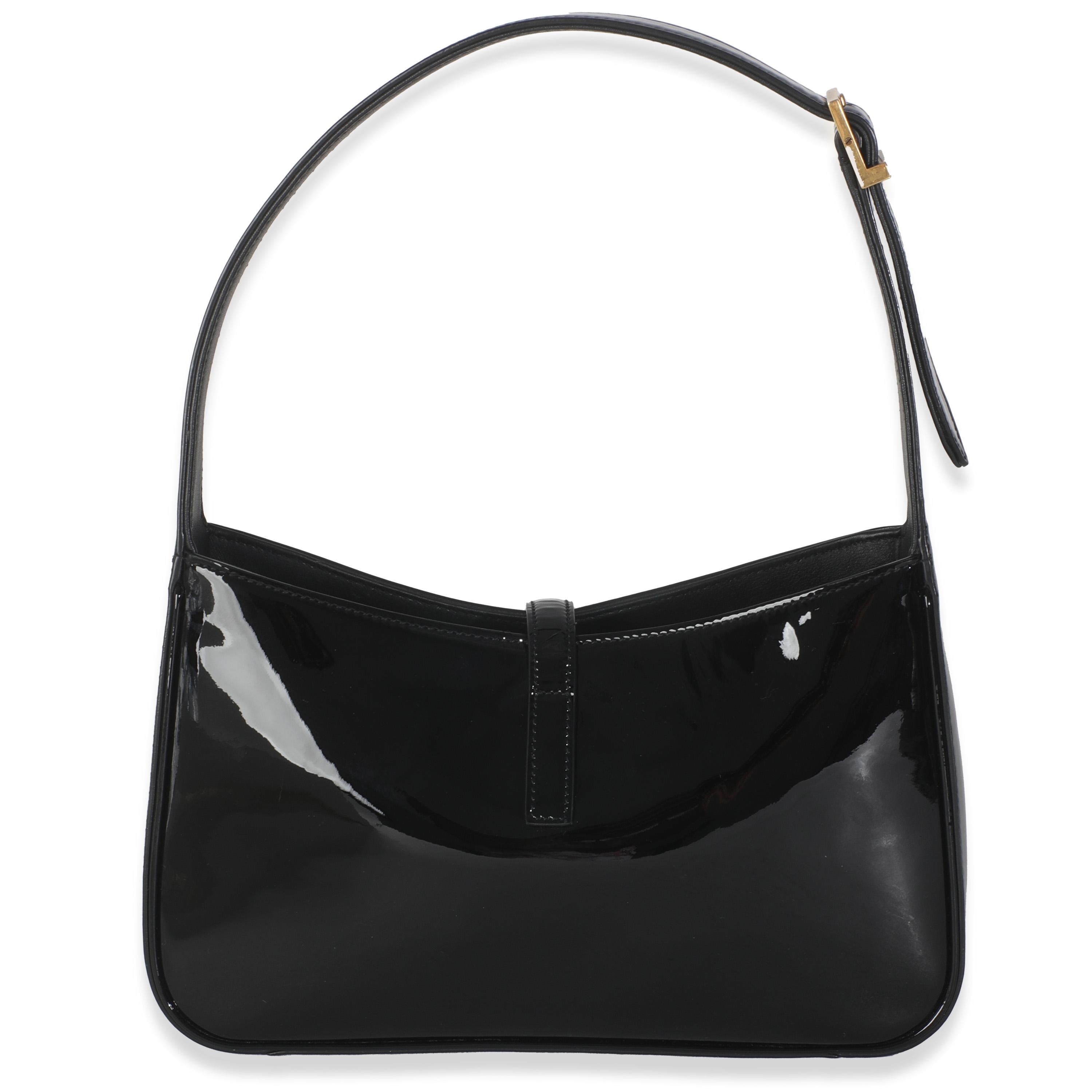 Titolo dell'elenco: Saint Laurent Brevetto Nero Le 5 a 7 Hobo
SKU: 145678
Condizioni: Usato 
Condit Description: Rive Gauche si riferisce alla riva meridionale della Senna, altrimenti nota come Rive Gauche o Rive Gauche in francese. Questa zona è