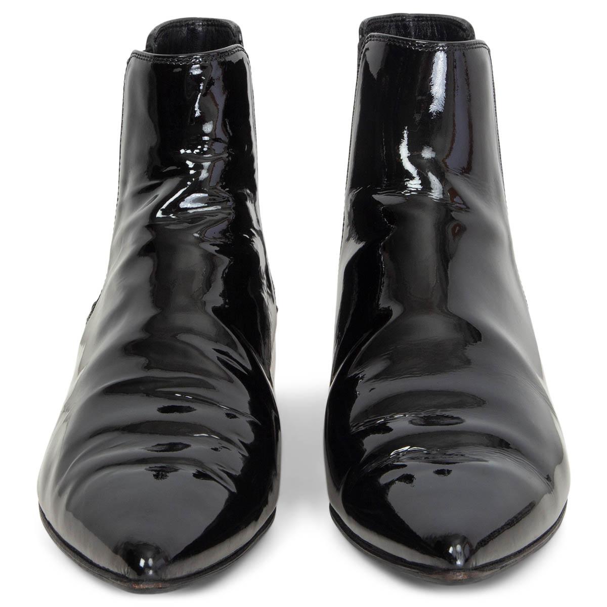 100% authentic Saint Laurent pointed-toe ankle-boots in black patent leather. Have been worn with some soft creasing on the instep. Overall in excellent condition. Rubber sole has been added. Come with dust bag. 

Measurements
Imprinted Size	36
Shoe