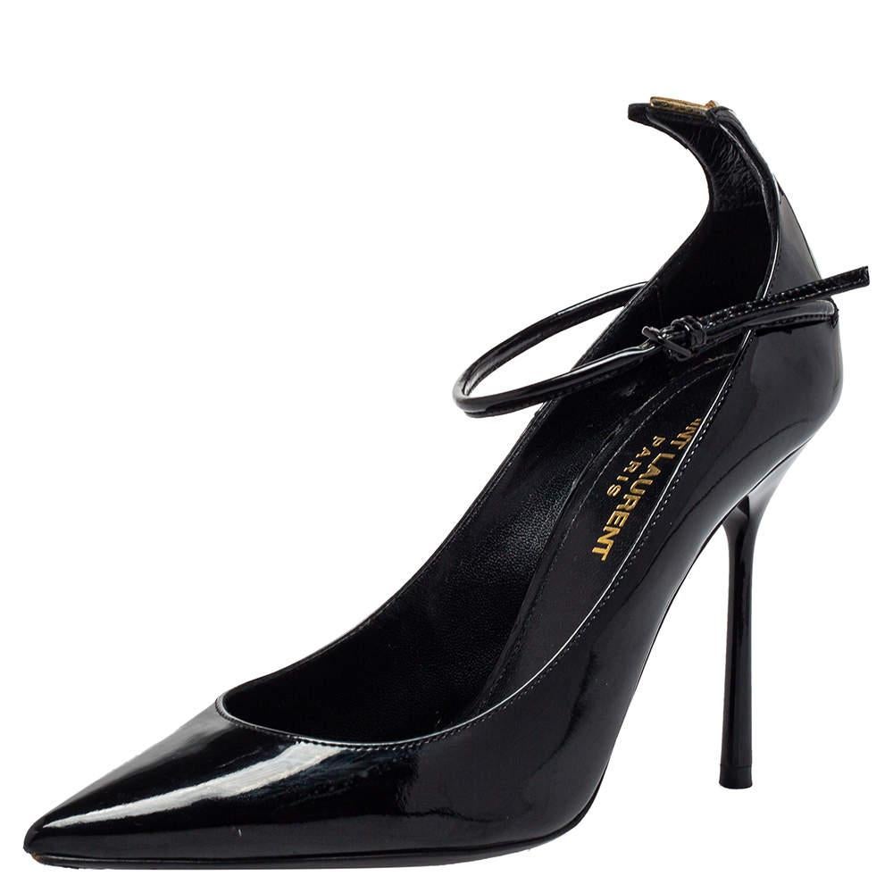 Get these gorgeous Saint Laurent pumps to attain a fashion-forward look. Featuring pointed toes, they come crafted from black patent leather and designed with buckle ankle straps, the signature 'Y' on the counters, and 9.5 cm heels. Endowed with
