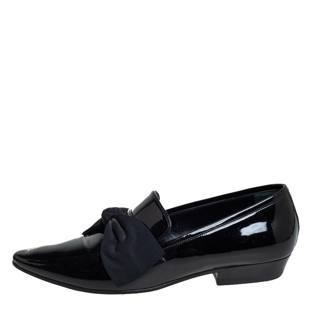 Loafers like these ones from Saint Laurent are worth every penny because they epitomize both comfort and style. Crafted from patent leather, they carry pointed toes and bow details on the vamps. Complete with leather insoles, this black pair is a
