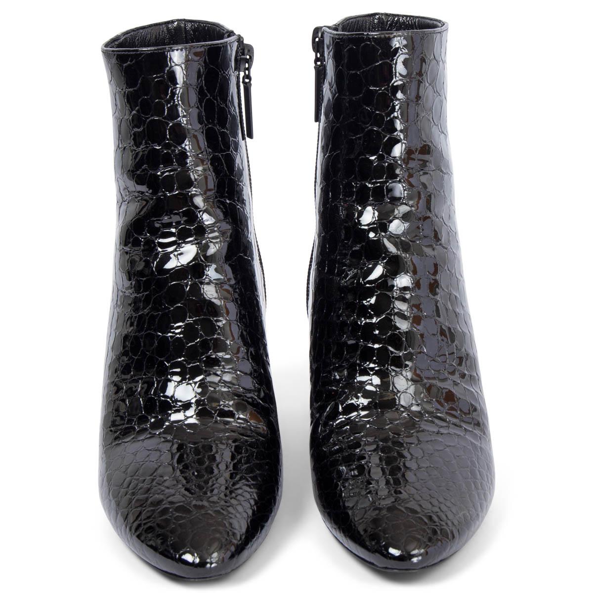 100% authentic Saint Laurent Jane ankle boots in black croco embossed patent leather featuring almond toe and high block heel. Open with a zipper on the inside. Have been worn once and are in excellent condition. 

Measurements
Imprinted