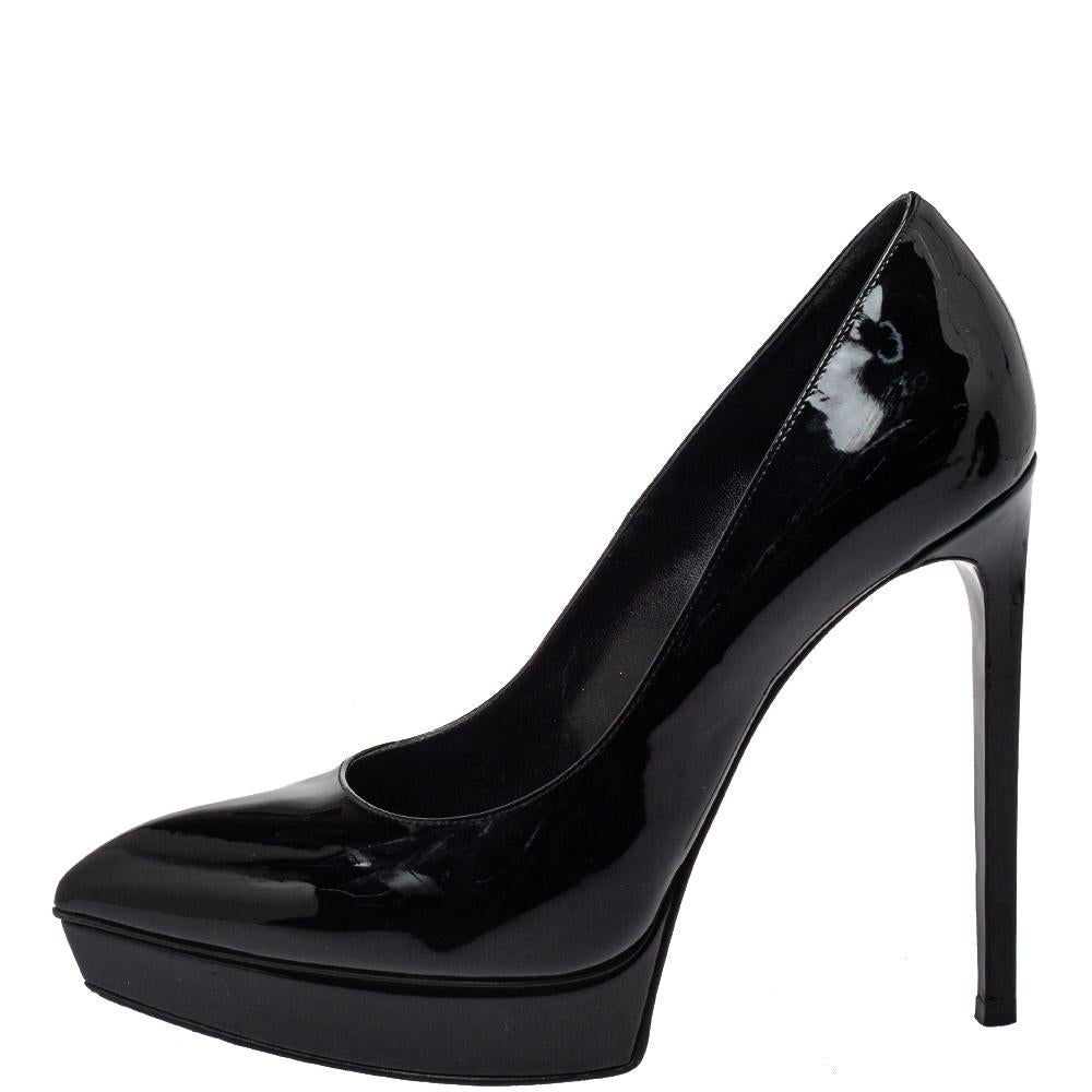 We've fallen head over heels in love with these pumps from Saint Laurent Paris! They are crafted from patent leather and styled with pointed toes, platforms, and 14 cm heels. Truly high fashion, this pair will effortlessly bring out the fashionista