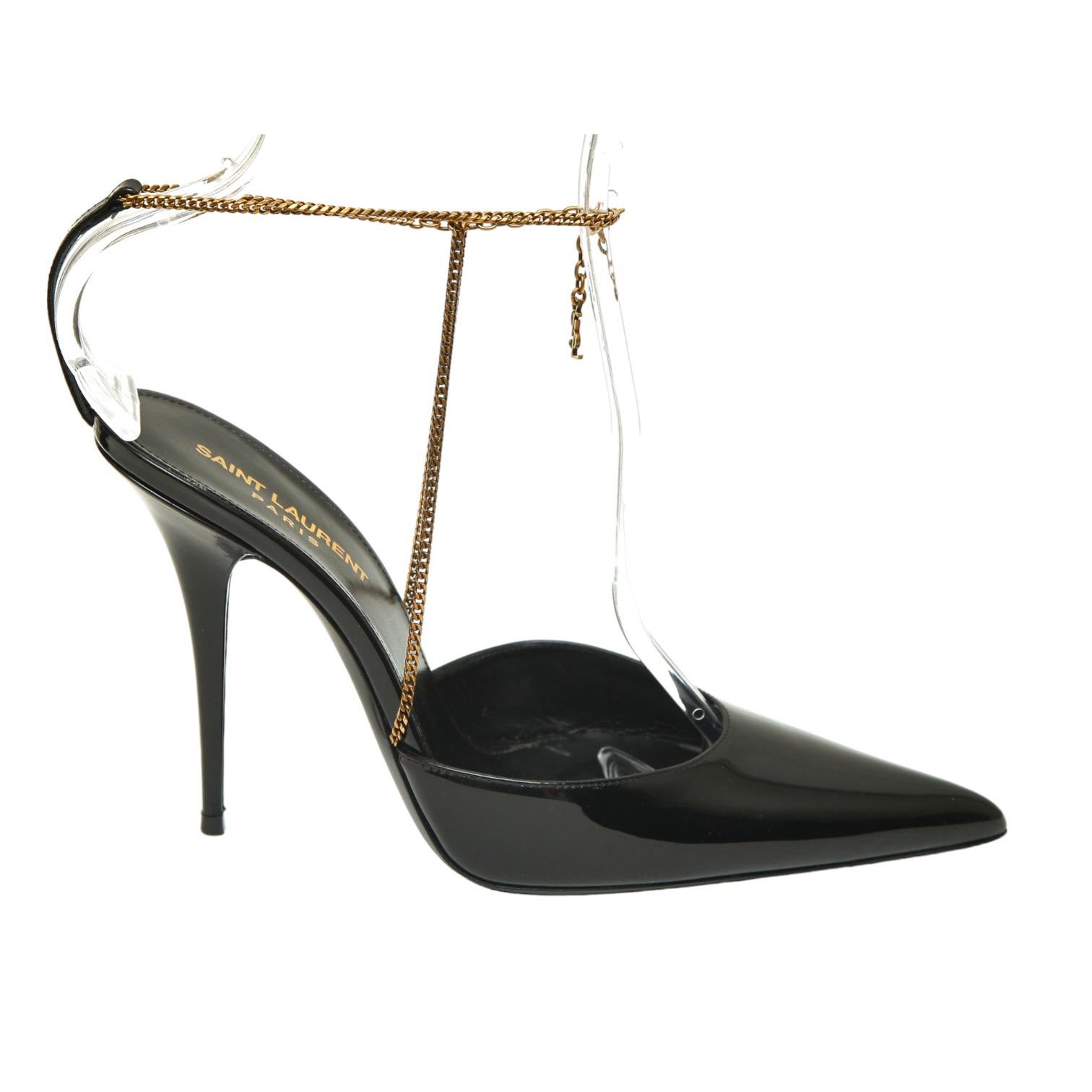 GUARANTEED AUTHENTIC SAINT LAURENT BLACK PATENT LEATHER CLAW CHAIN PUMPS

Retail excluding sales taxes $1,590.

Details:
- Black patent leather uppers.
- Pointed toe.
- Antique gold ankle chain with hanging YSL logo.
- Claw clasp closure.
- Self