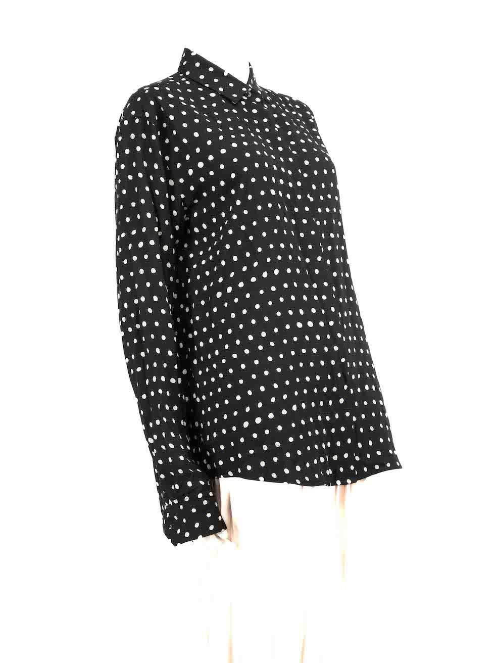 CONDITION is Good. Minor wear to the blouse is evident. There is discolouration on the internal collar and the inner underarm. A small mark on the internal right side of this used Saint Laurent designer resale item.
 Details
 Black
 Viscose
 Shirt
