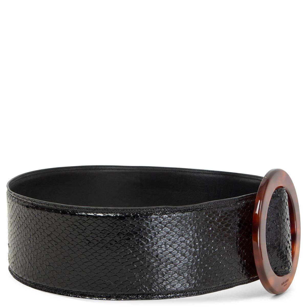 100% authentic Saint Laurent waist belt in black python with a round tortoiseshell acetate buckle. Has been worn with some scratches on the buckle. Overall in very good condition. 

Measurements
Tag Size	85
Width	7.5cm (2.9in)
Length	99cm