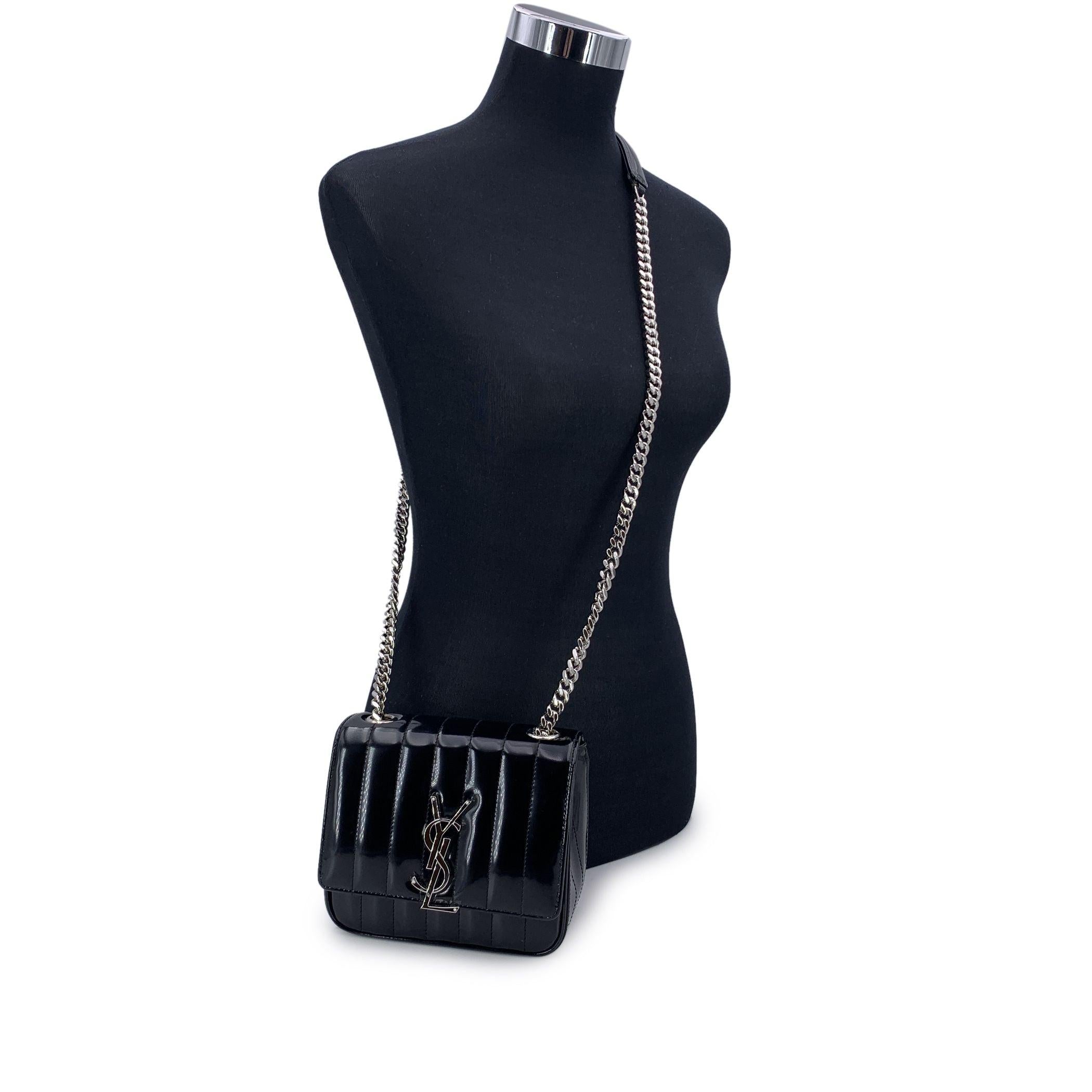 This beautiful Bag will come with a Certificate of Authenticity provided by Entrupy. The certificate will be provided at no further cost Embodying the effortless elegance of Saint Laurent, the black quilted patent leather Small 'Vicky' Crossbody Bag