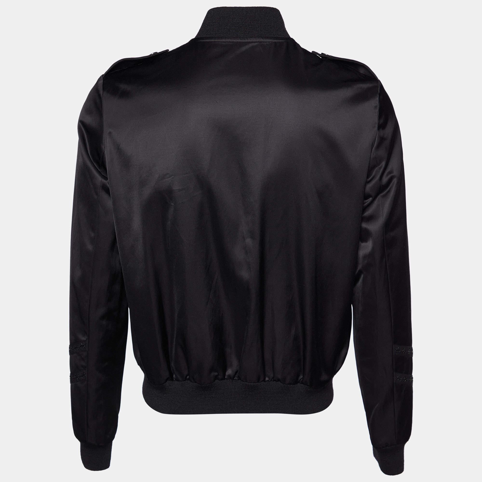 This Saint Laurent black jacket offers the satisfaction of a comfortable fit and refined style. It is made of satin and designed with a front zipper, embellishments, and long sleeves.

Includes: Brand Tag