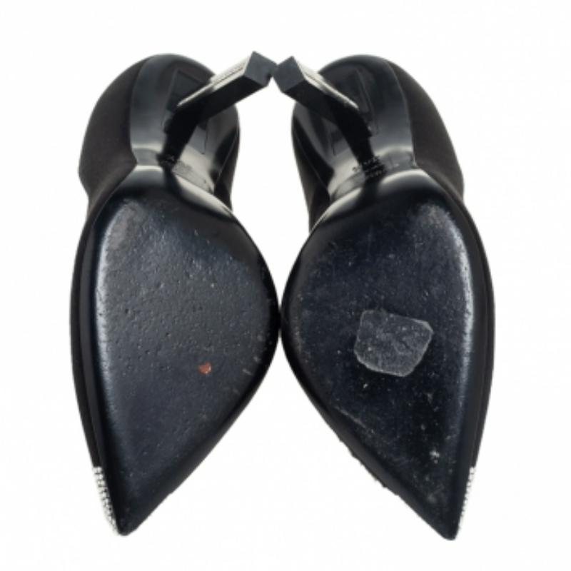 The Tower pumps from Saint Laurent are stylish and appealing in every way. Their exterior is created using black satin material and features embellishments on the pointed toes. Style these gorgeous pumps with a matching black dress as you head out.