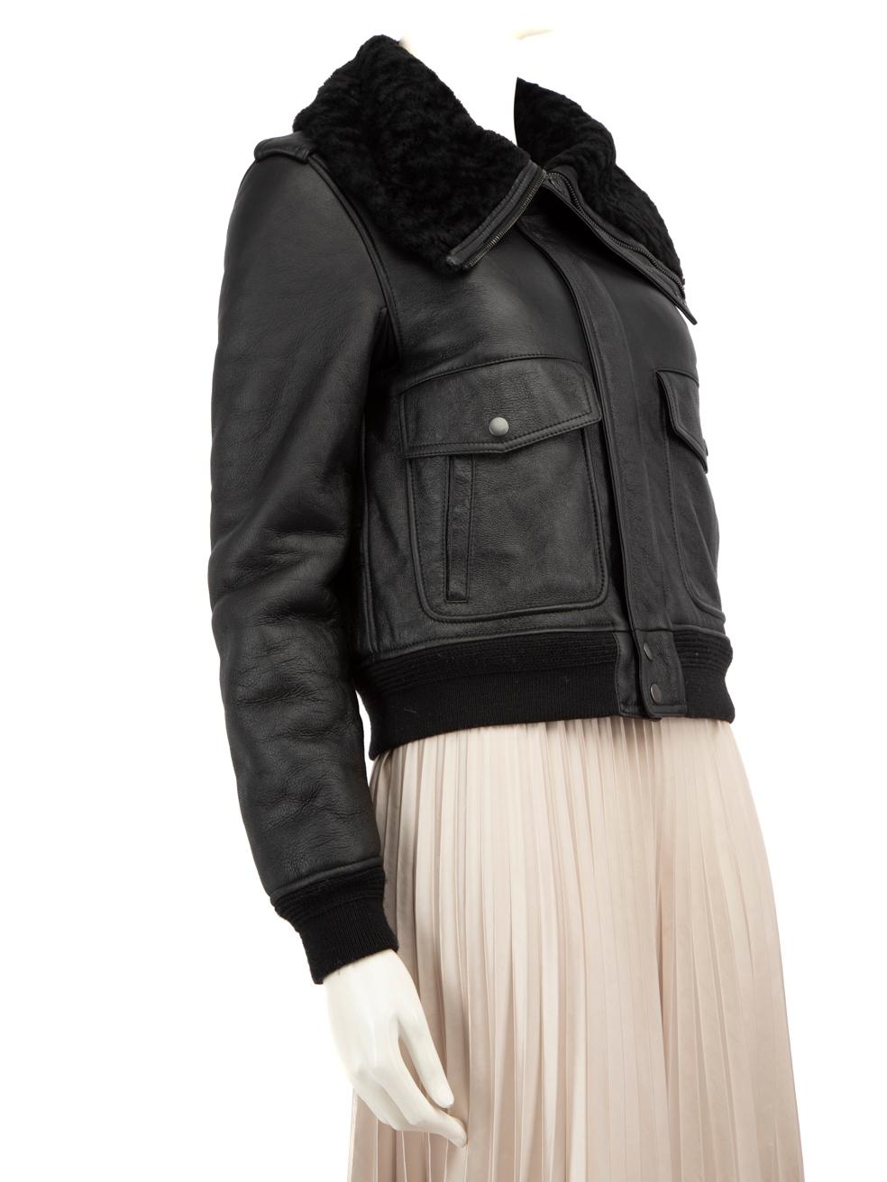 CONDITION is Very good. Hardly any visible wear to the coat is evident on this used Saint Laurent designer resale item.
 
 Details
 Black
 Leather
 Biker jacket
 Shearling lined
 Knitted trim
 Long sleeves
 Front zip and snap button fastening
 2x
