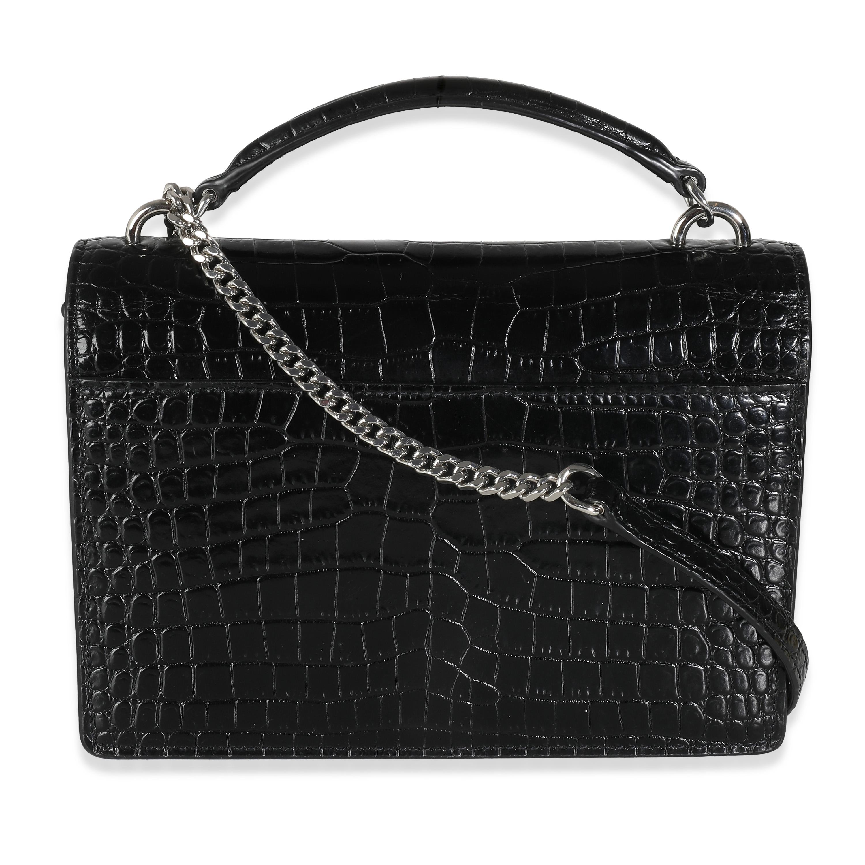 Listing Title: Saint Laurent Black Shiny Croc Embossed Sunset Chain Wallet
SKU: 139910
MSRP: 2390.00 USD
Condition: Pre-owned 
Handbag Condition: Very Good
Condition Comments: Item is in very good condition with minor signs of wear.   Faint corner