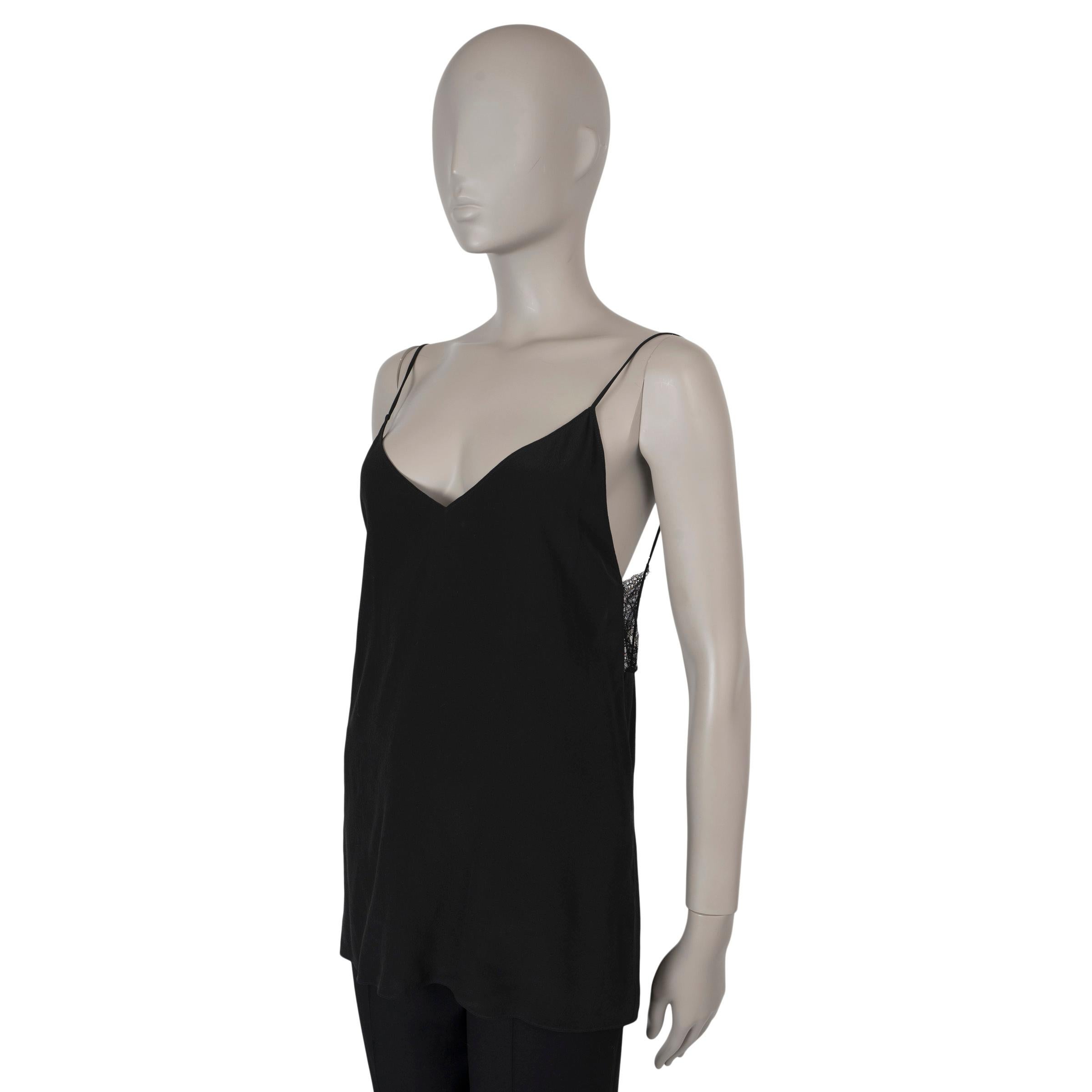 This 100% authentic Saint Laurent camisole in black crepe silk exudes elegance and simplicity. It features a flattering V-neck, delicate spaghetti straps, and a subtle lace trim in the back for an added touch of femininity. Unlined, this camisole