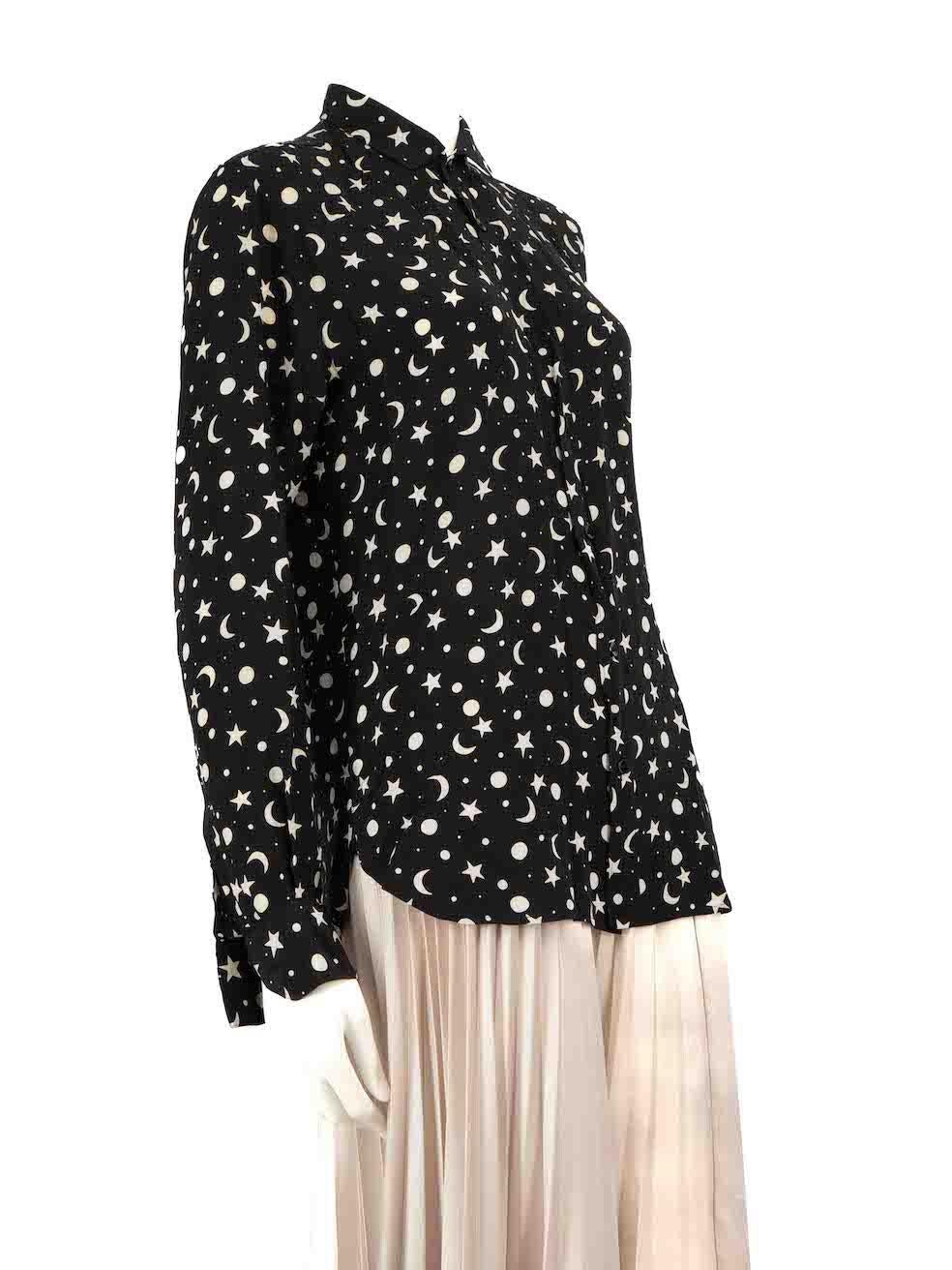 CONDITION is Very good. Minimal wear to shirt is evident. Minimal wear to front with missing button and a small stainon this used Saint Laurent designer resale item. 
 
 Details
 Black
 Silk
 Collar shirt
 Long sleeves
 Star and moon pattern
 Round