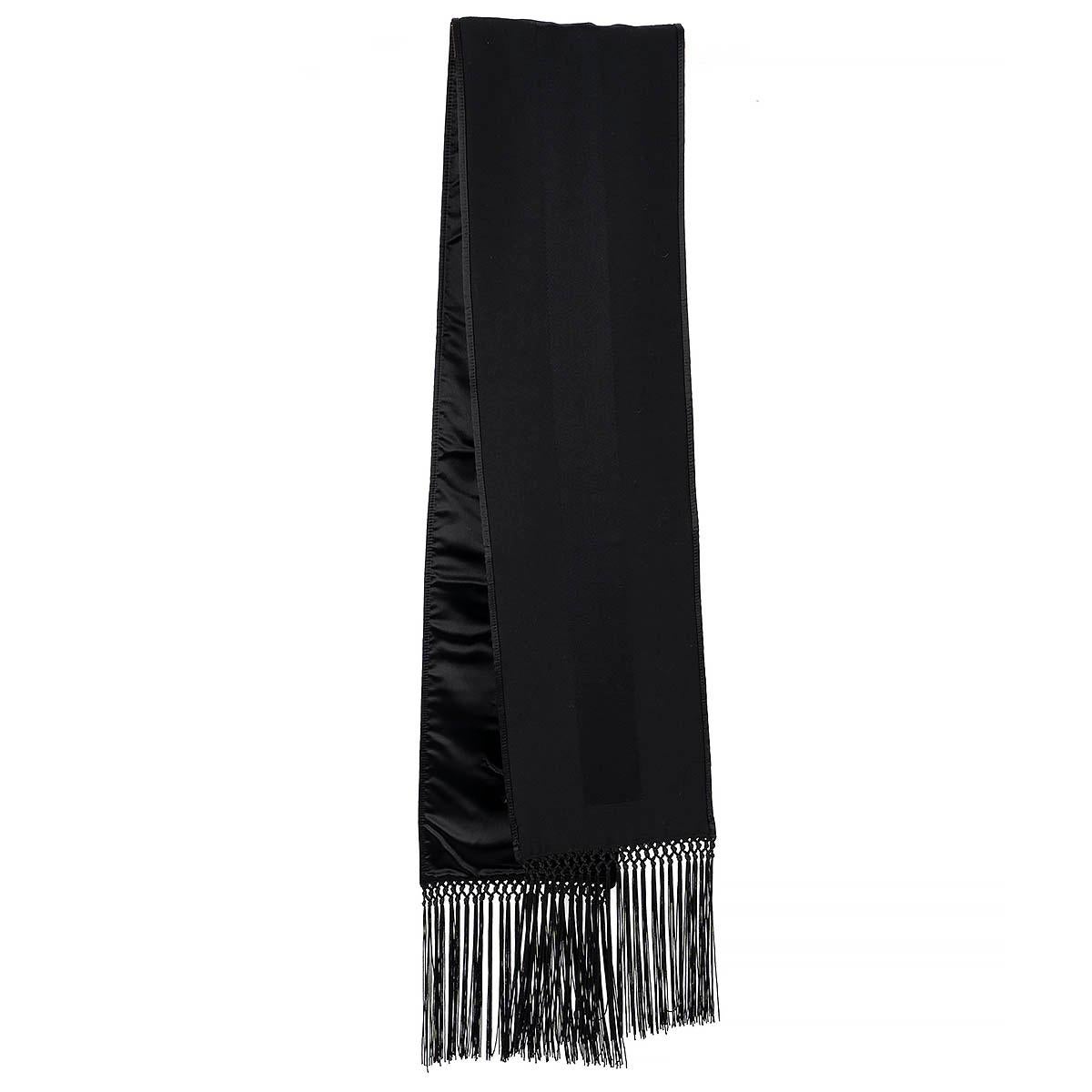 100% authentic Saint Laurent fringed doubleface scarf in black silk satin and wool (missing tag) embroidered with the YSL logo.  Has been worn and is in excellent condition. 

Measurements
Width	19.5cm (7.6in)
Length	160cm (62.4in)

All our listings