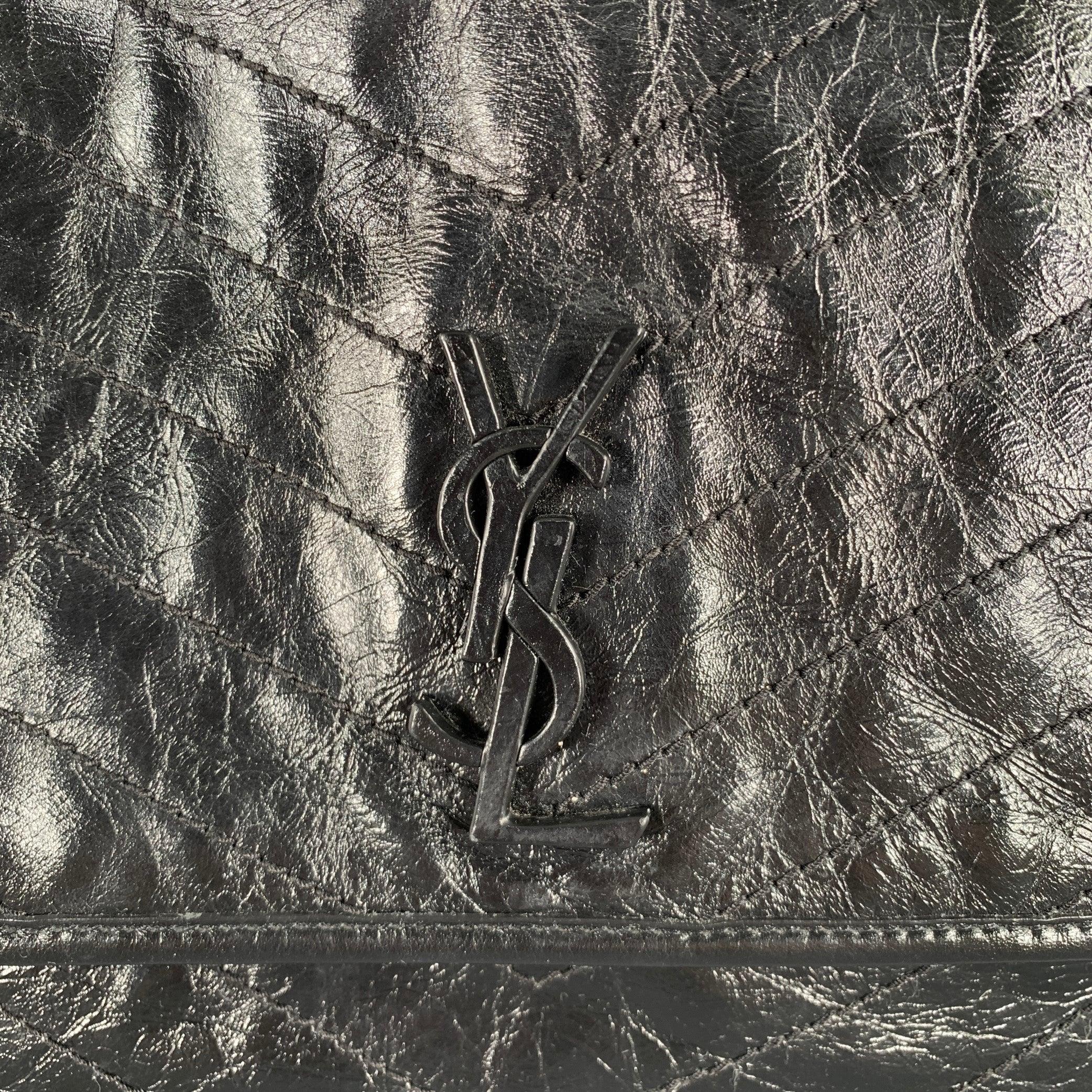 SAINT LAURENT bag comes in a black quilted leather featuring 