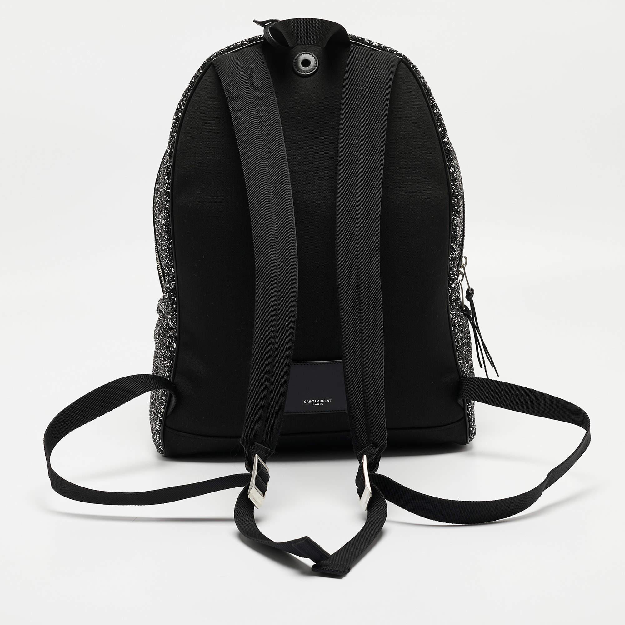 This practical and fashionable Saint Laurent backpack will come in handy for daily use or as a style statement. It is smartly designed with a spacious interior for your belongings. Two shoulder straps make it ready to be yours.

Includes: Original