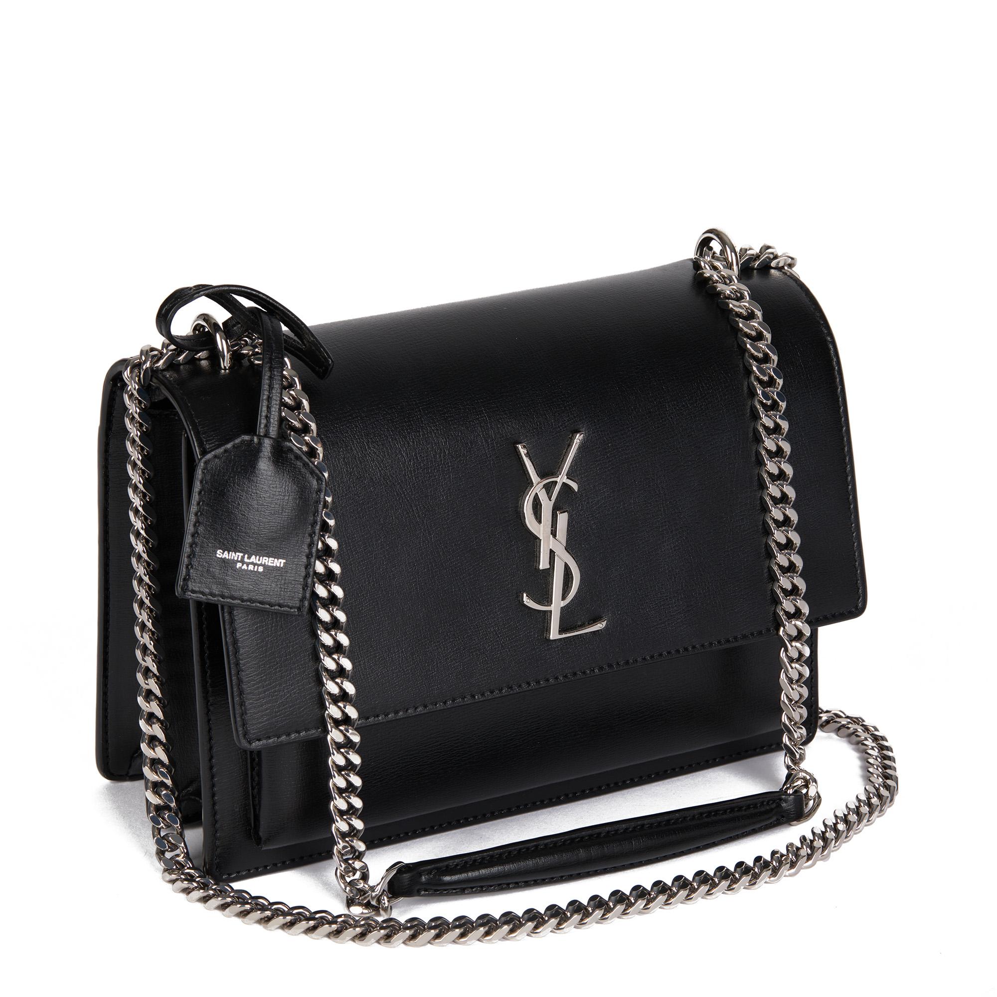 SAINT LAURENT
Black Smooth Calfskin Leather Medium Sunset Chain Bag

Xupes Reference: CB725
Serial Number: BC1442906-1021
Age (Circa): 2020
Accompanied By: Clochette
Authenticity Details: Date Stamp (Made in Italy)
Gender: Ladies
Type: Shoulder,