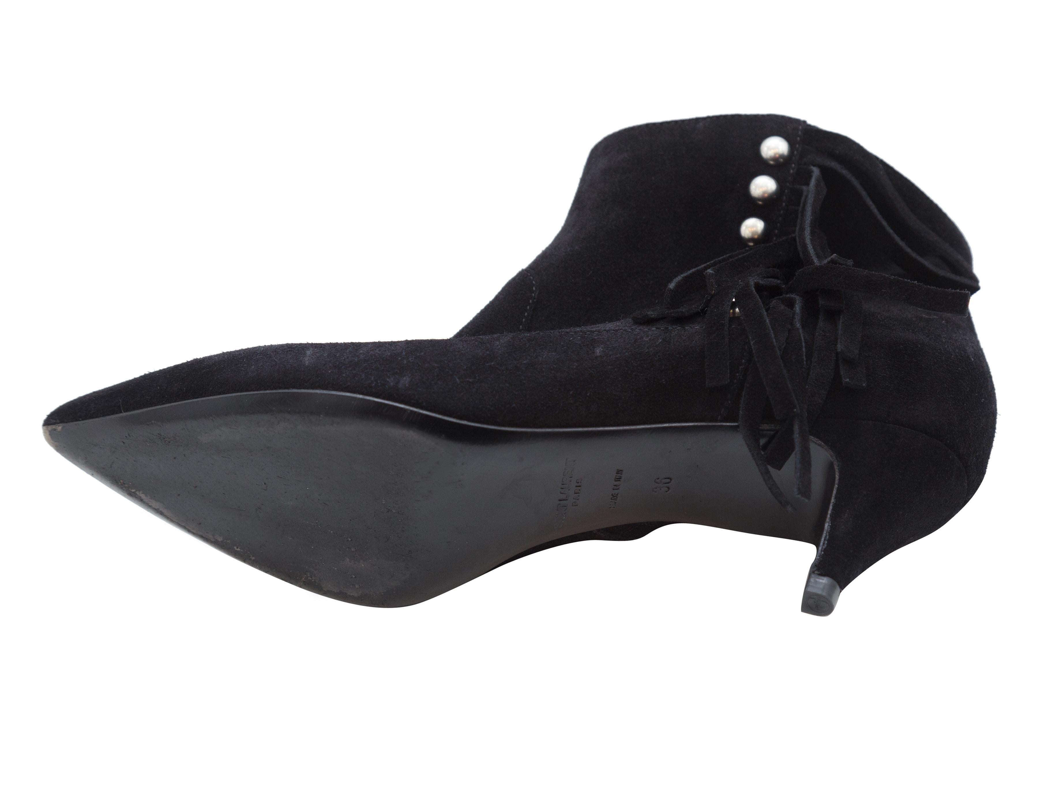 Product details:  Black Saint Laurent Suede Booties with Fringe. Zips close. Pointed toe.  2