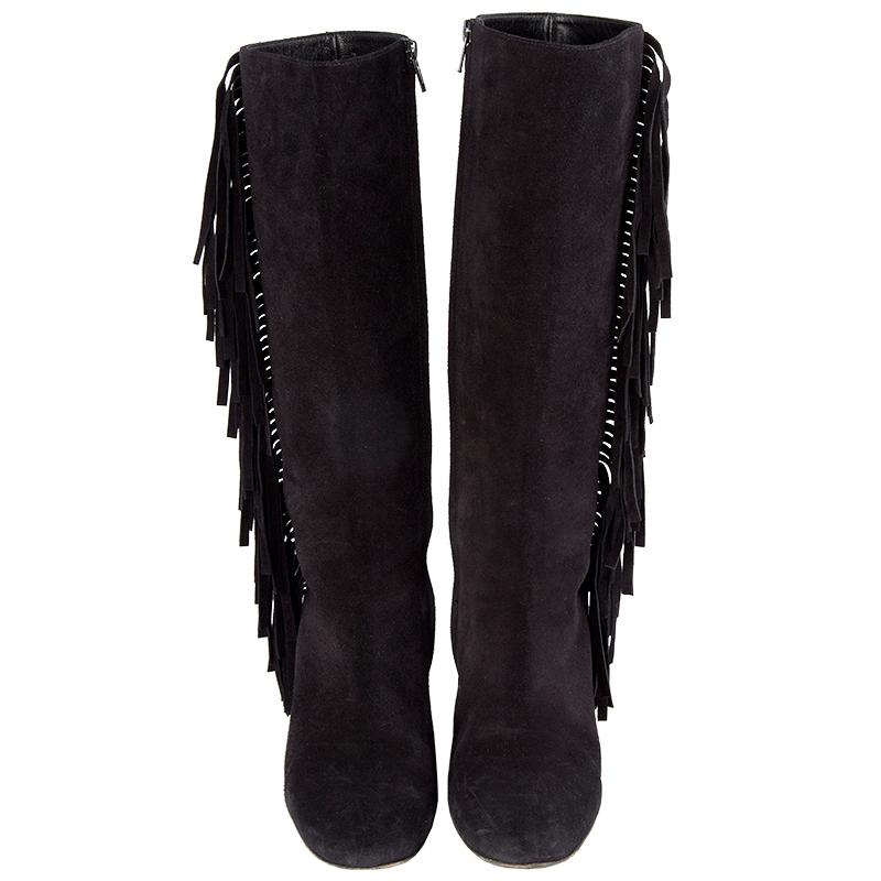 100% authentic Saint Laurent fringe boots in black suede leather. Open with a zipper on the inside. Have been worn and are in excellent condition.

Imprinted Size	39
Shoe Size	39
Inside Sole	26cm (10.1in)
Width	7.5cm (2.9in)
Heel	7cm