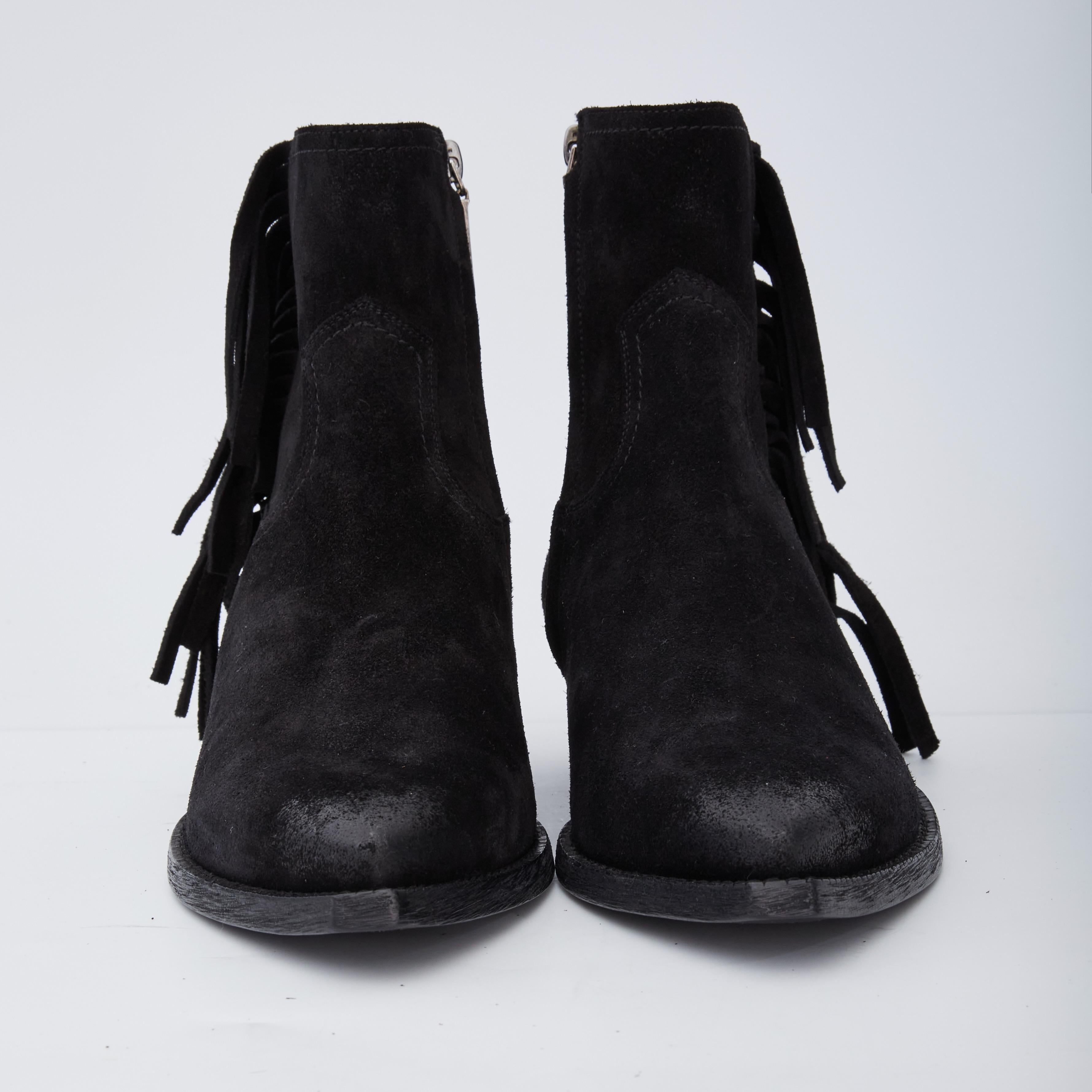 Women's Saint Laurent black sueded buckle booties.

COLOR: Black
MATERIAL: Suede
ITEM CODE: 565591
SIZE: 38 EU / 7 US
HEEL HEIGHT: 40 mm / .9”
CONDITION: New
COMES WITH: Dust bag and box 

Made in Italy