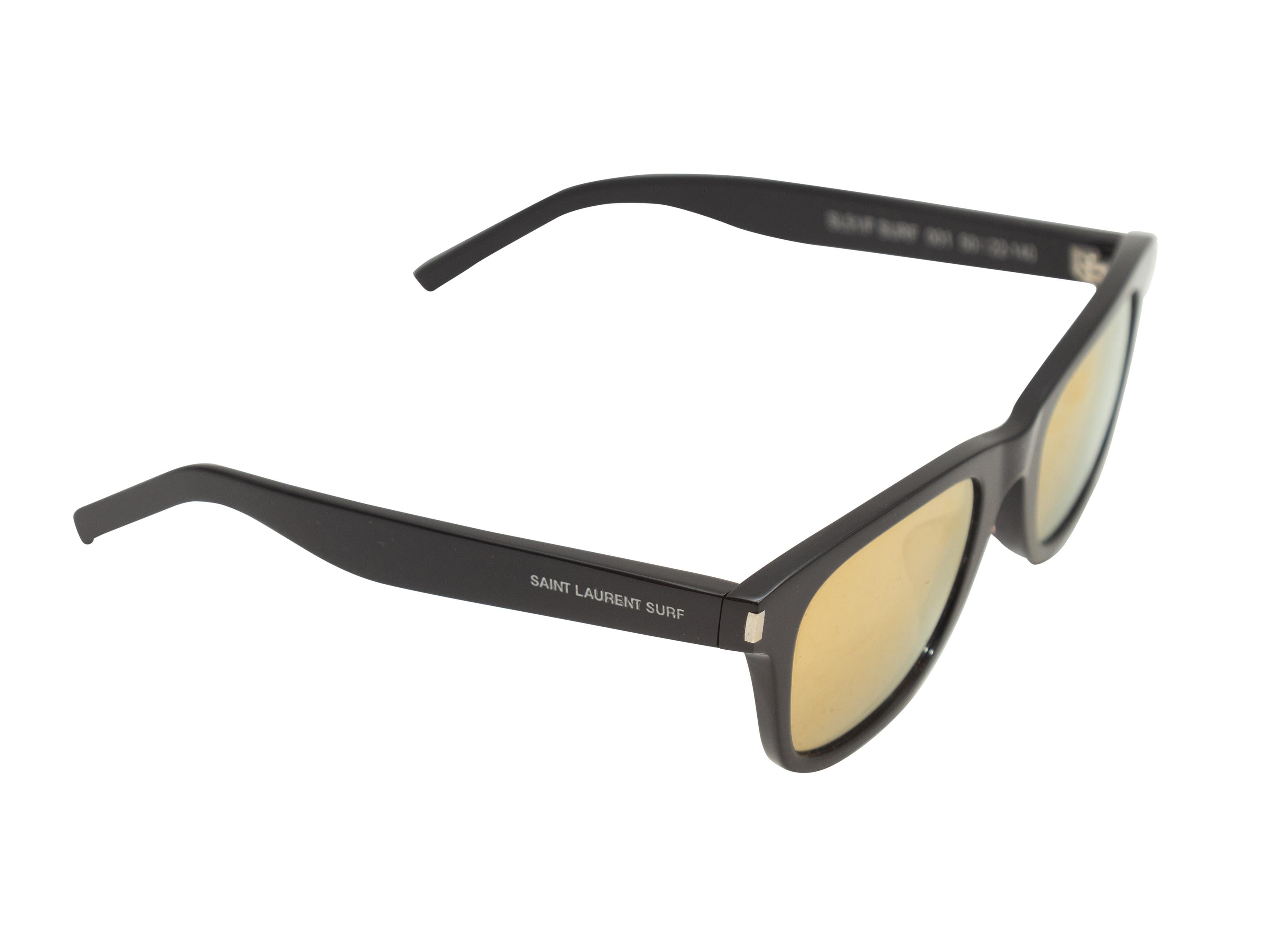 Product details: Black Surf sunglasses by Saint Laurent. Yellow tinted lenses. 1.75