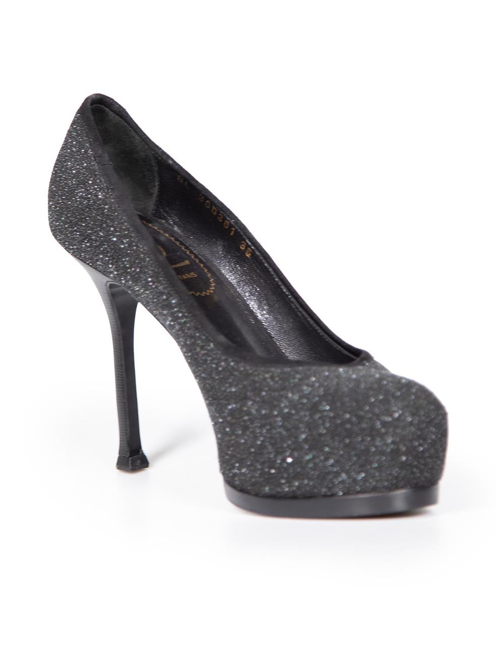 CONDITION is Very good. Minimal wear to shoes is evident. Minimal wear to both shoe heels with abrasions on this used Yves Saint Laurent designer resale item.
 
 Details
 Black
 Textured glitter
 Pumps
 Platform
 High heeled
 Slip on
 Round toe
 
 
