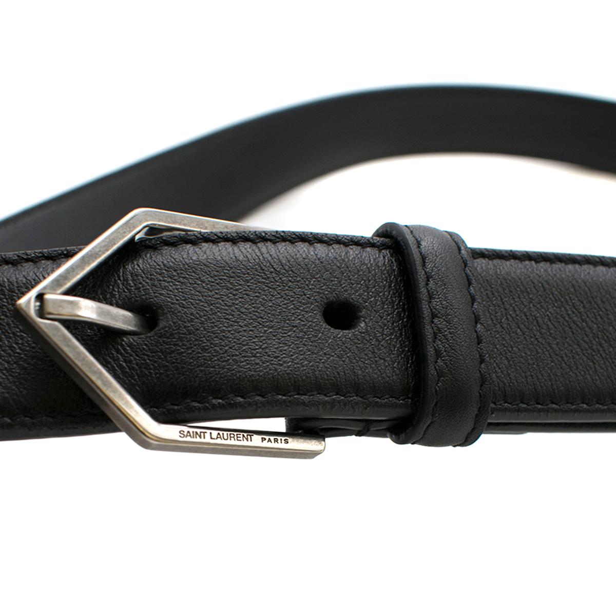 Saint Laurent Black Triangle Buckle Leather Belt

- Black, leather
- Silver Saint Laurent 
  engraved hardware
- Five belt holes for 
  adjustable sizing
- Made in Italy 
- GRZ483041-70-1117

Please note, these items are pre-owned and may show some