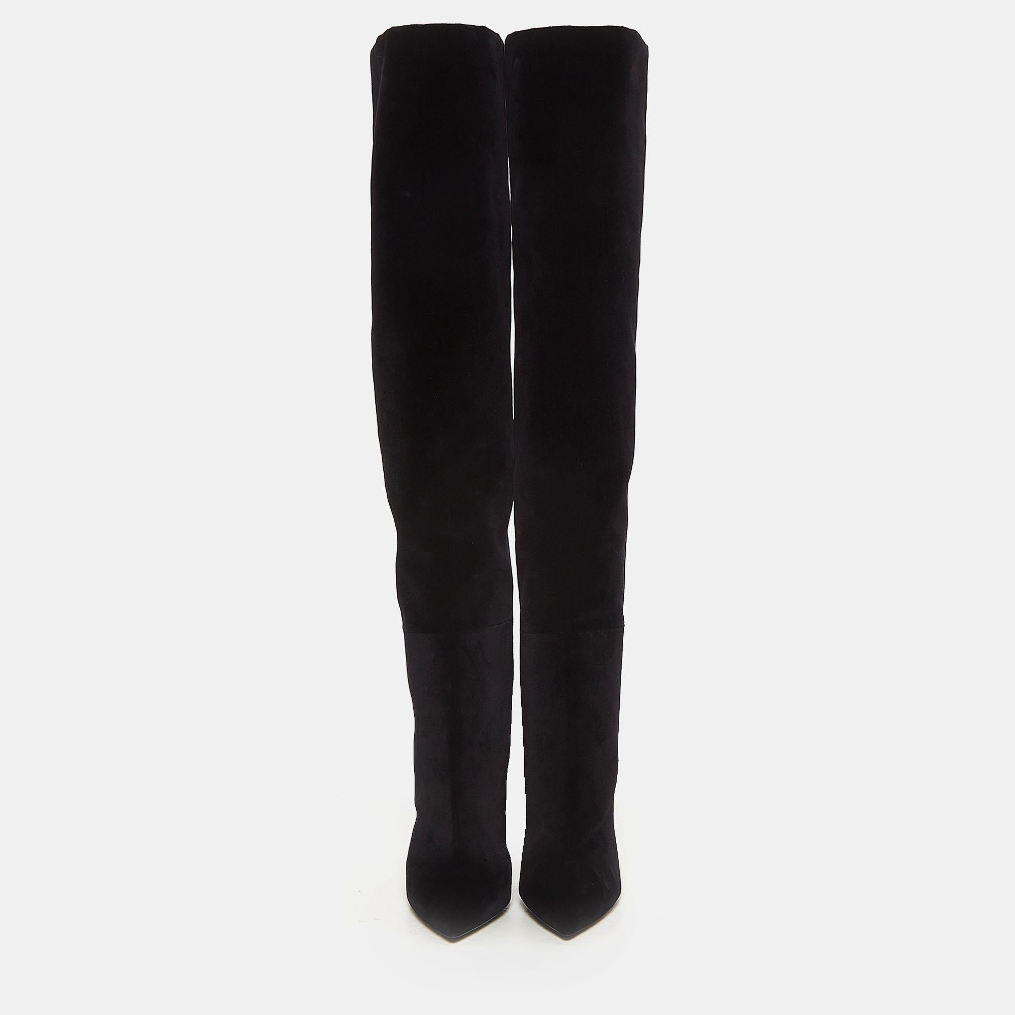 Saint Laurent never fails to design fashion-forward styles that become favorites in one's closet. These black over-the-knee boots for women are a fine example. Made from velvet, they feature pointed toes and 11.5 cm heels.

Includes
Original