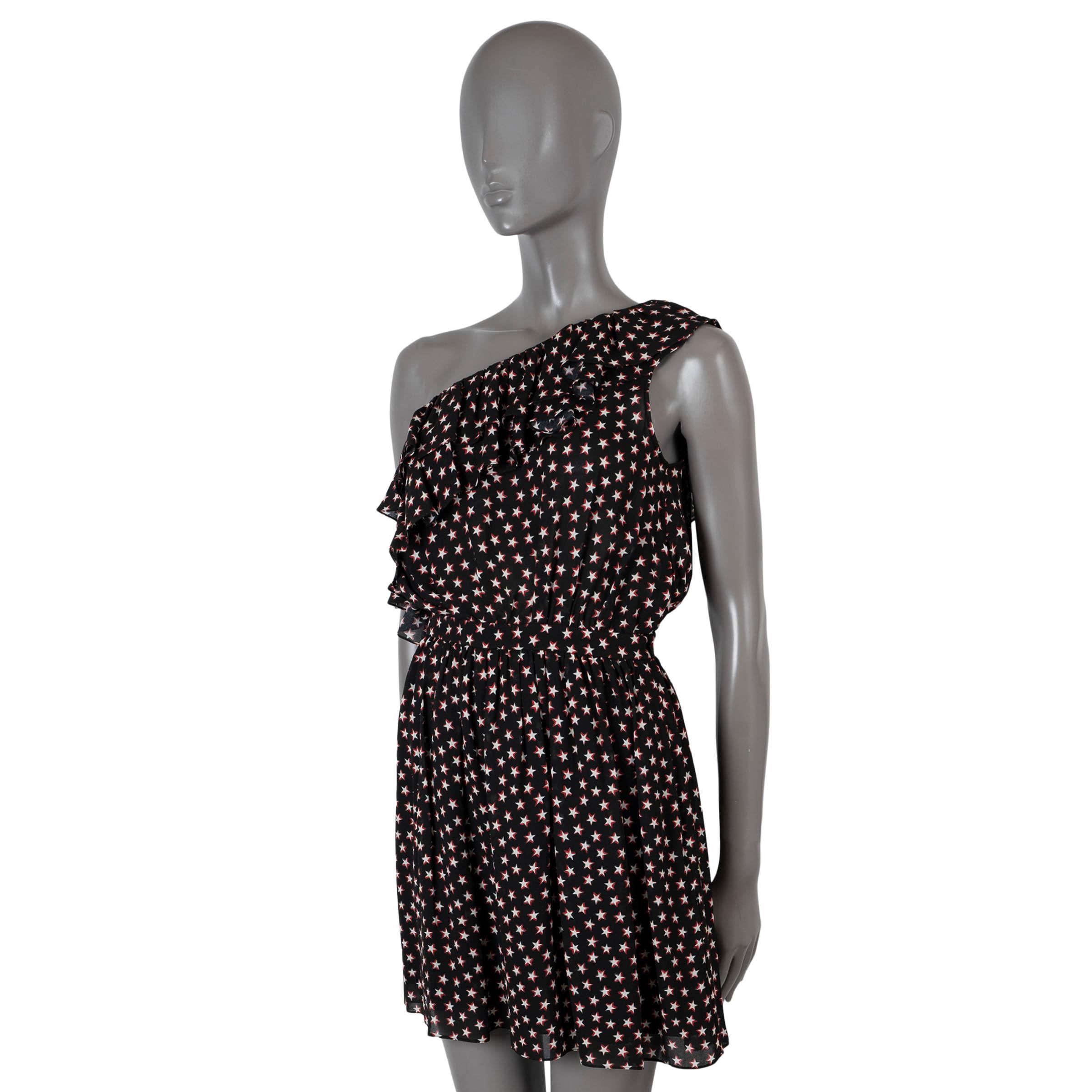 100% authentic Saint Laurent one-shoulder mini dress in black chiffon viscose (100%). Features all-over star print in white and red, ruffled neckline and elastic waist. Opens with a concealed zipper on the side and is partially lined in silk (100%).