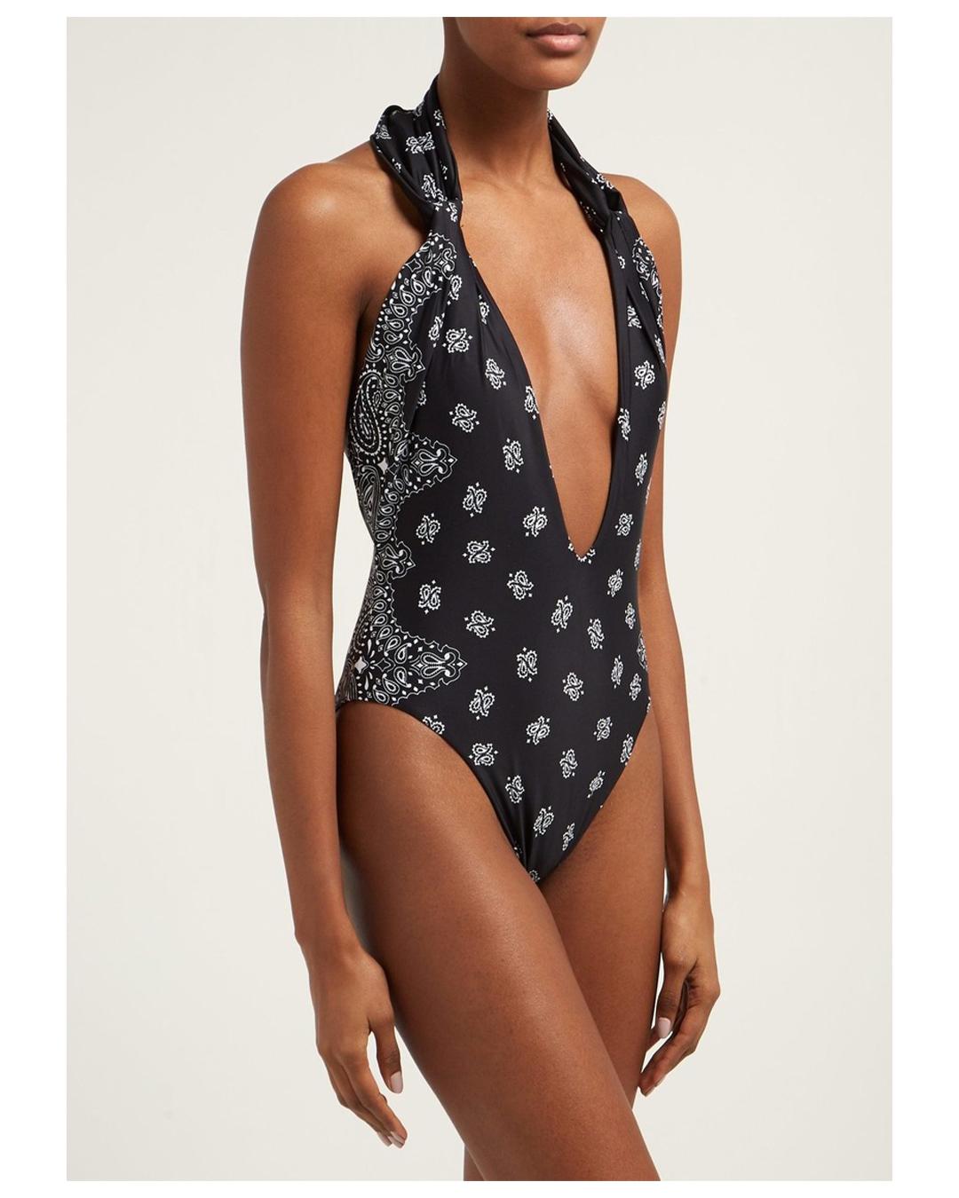 LOVE LALI Vintage

Saint Laurent bandana print black and white one piece swimsuit
Halter neck - ties at he back of the neck
Can be worn two ways, with a low plunging neckline or with the straps crossed over at the front creating a key hole