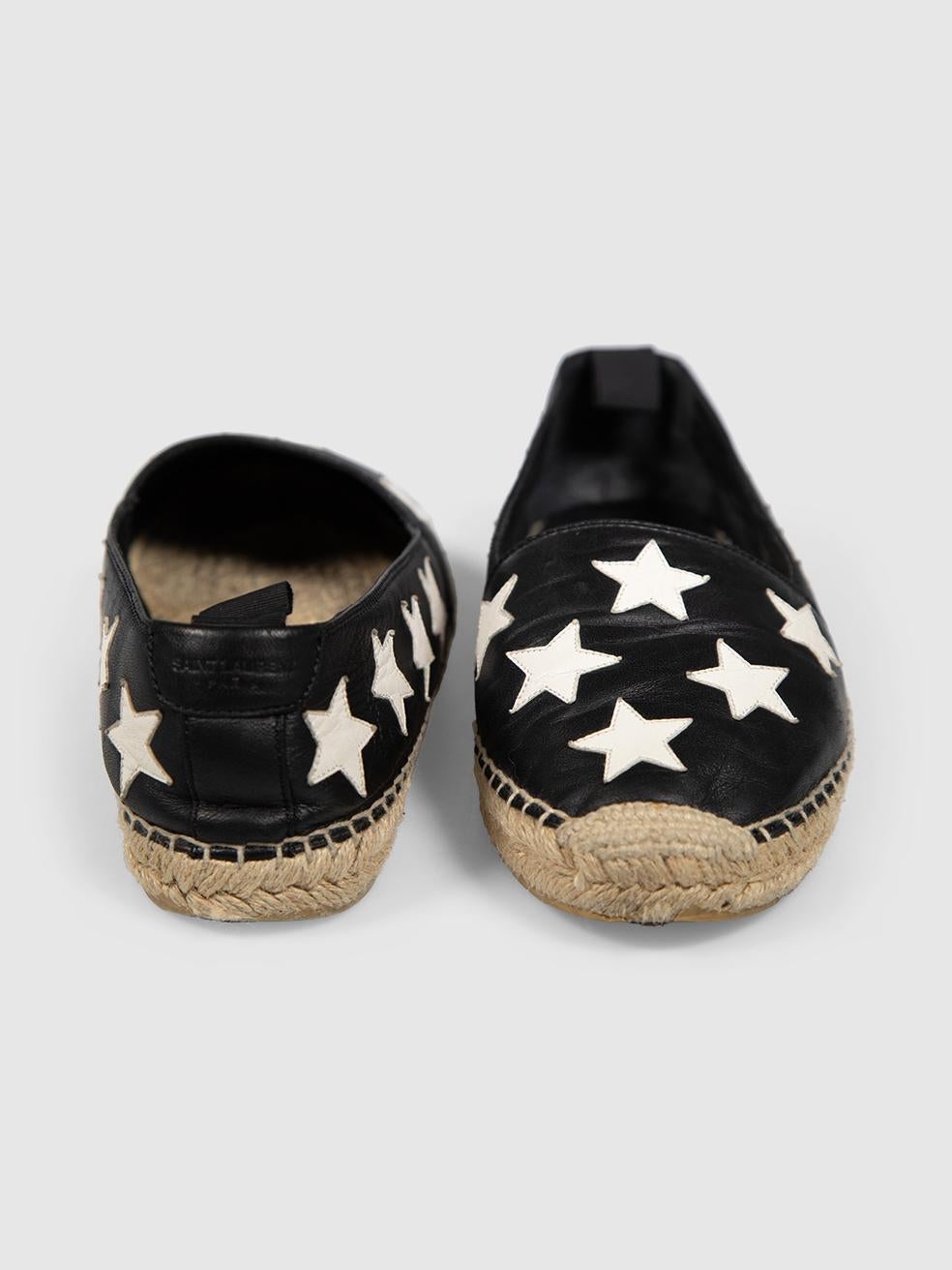 Nero Saint Laurent Espadrillas a stella in pelle bianca e nera misura IT 40 in vendita