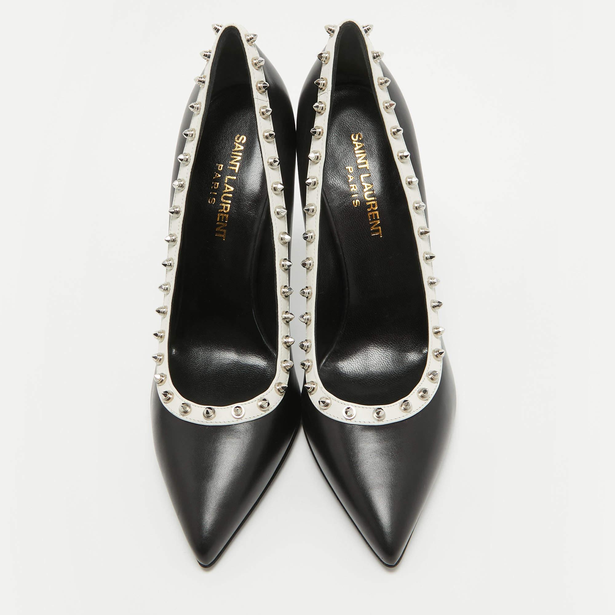 To lend your feet elegance, Saint Laurent brings you these gorgeous studded pumps. From their sleek shape and luscious black finish to their overall appeal, they are utterly mesmerizing. The pumps come crafted from leather and are designed with