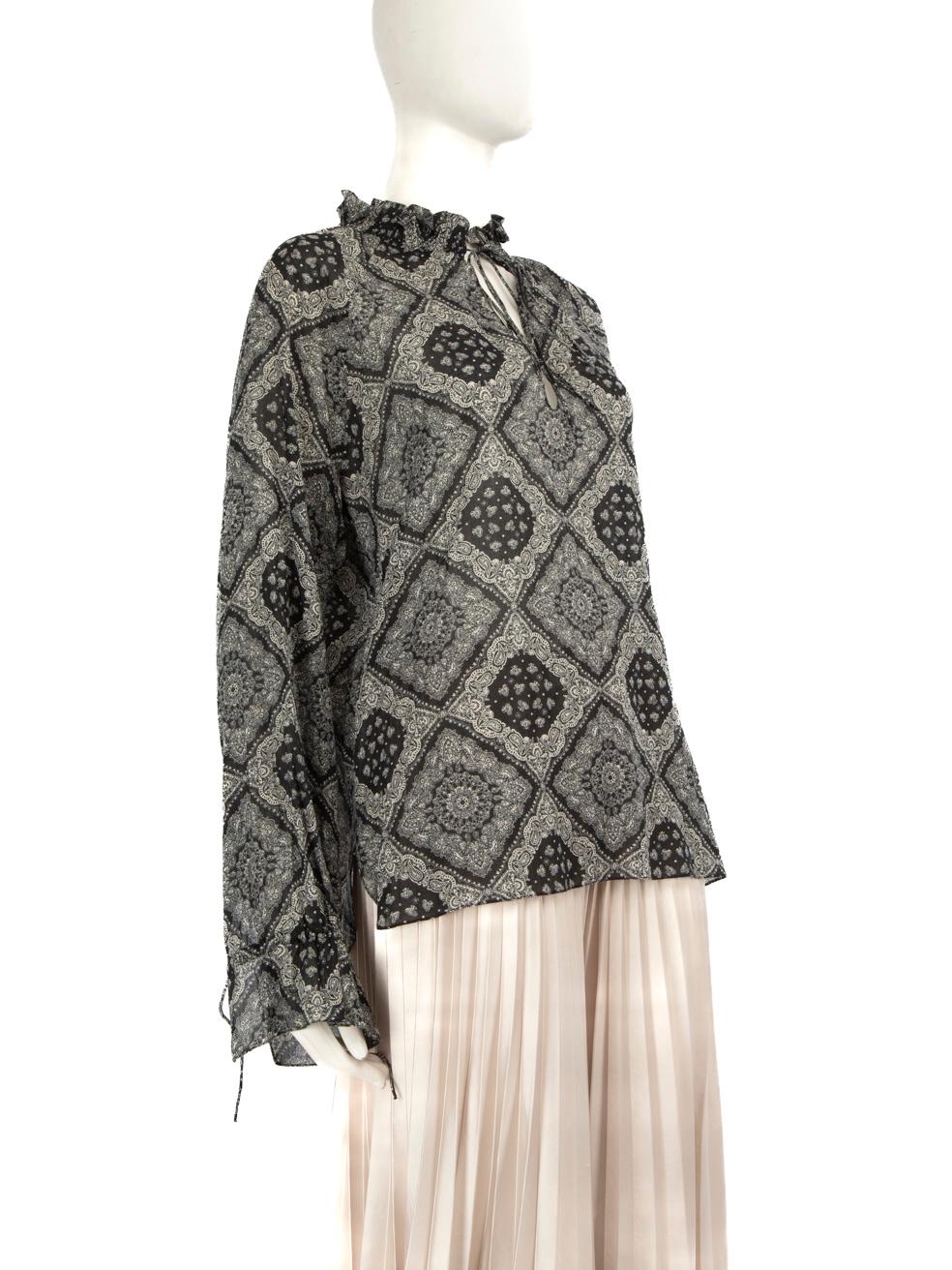 CONDITION is Very Good. Hardly any visible wear to the top is evident on this used Saint Laurent designer resale item.
  
  Details
  
  
  Multicolour - Black and white 
  
  Cotton 
  
  Blouse 
  
  Long sleeve 
  
  See through 
  
  Paisley